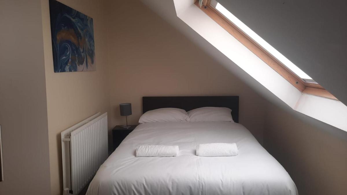 Three-Bedroom Apartment photo 1