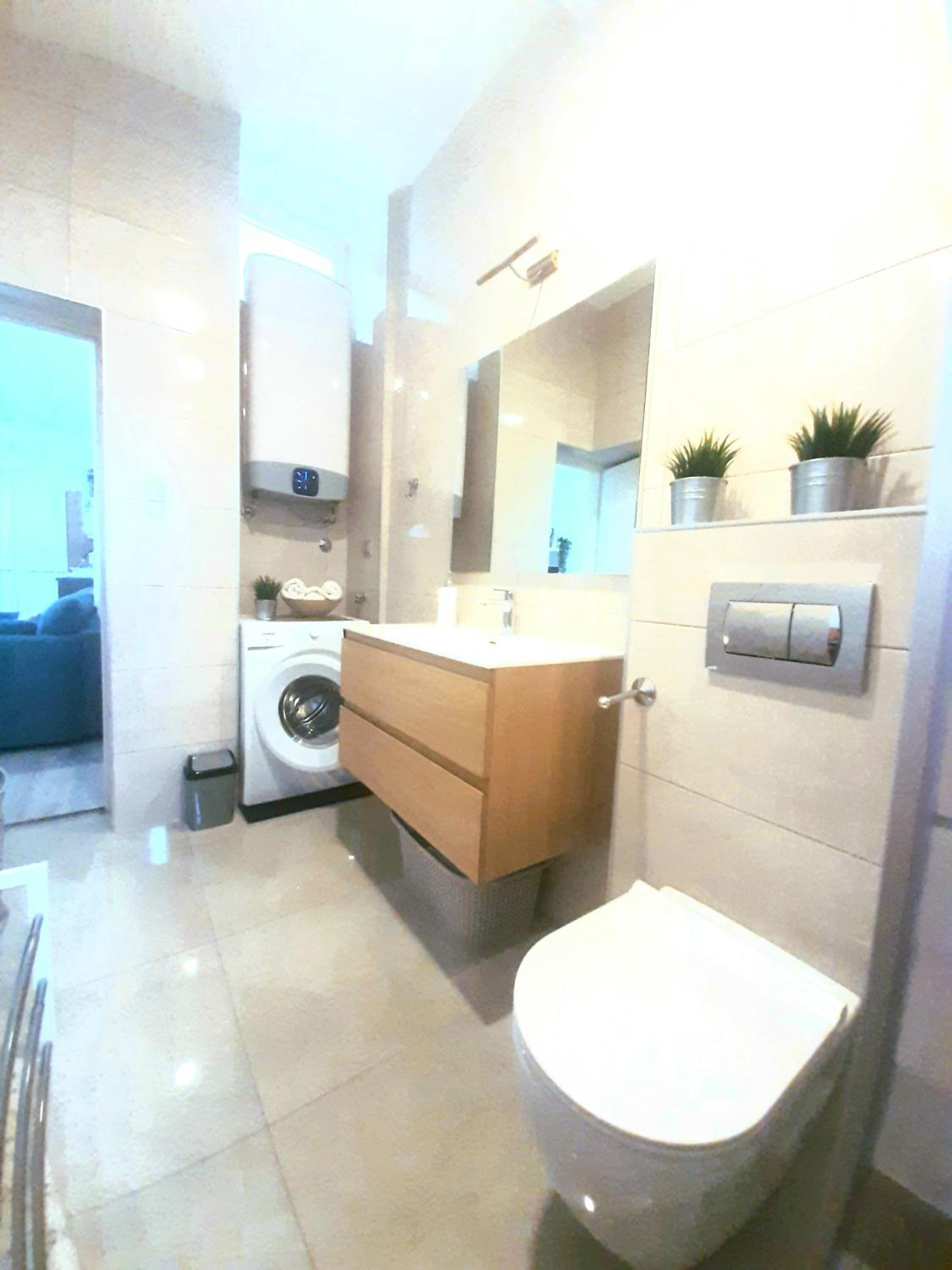 Two-Bedroom Apartment - Photo 38
