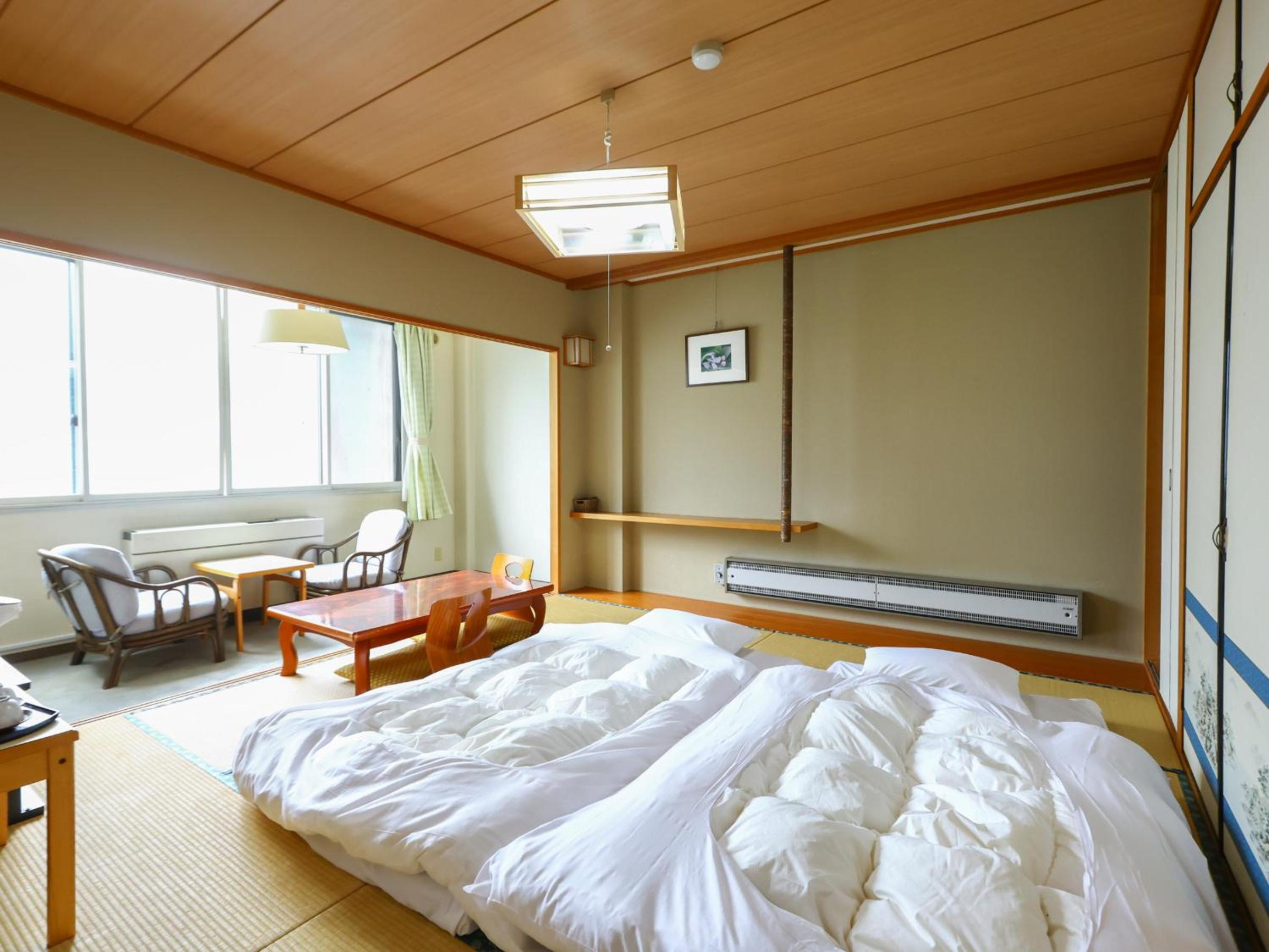 Quadruple Room with Private Bathroom - Non-Smoking photo 1