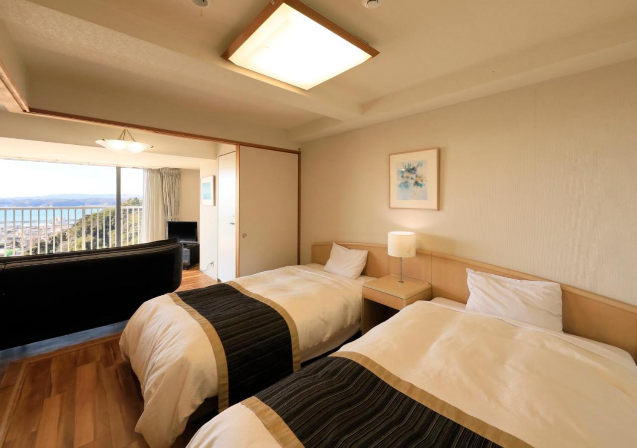 Economy Quadruple Room- Non-Smoking - Photo 6