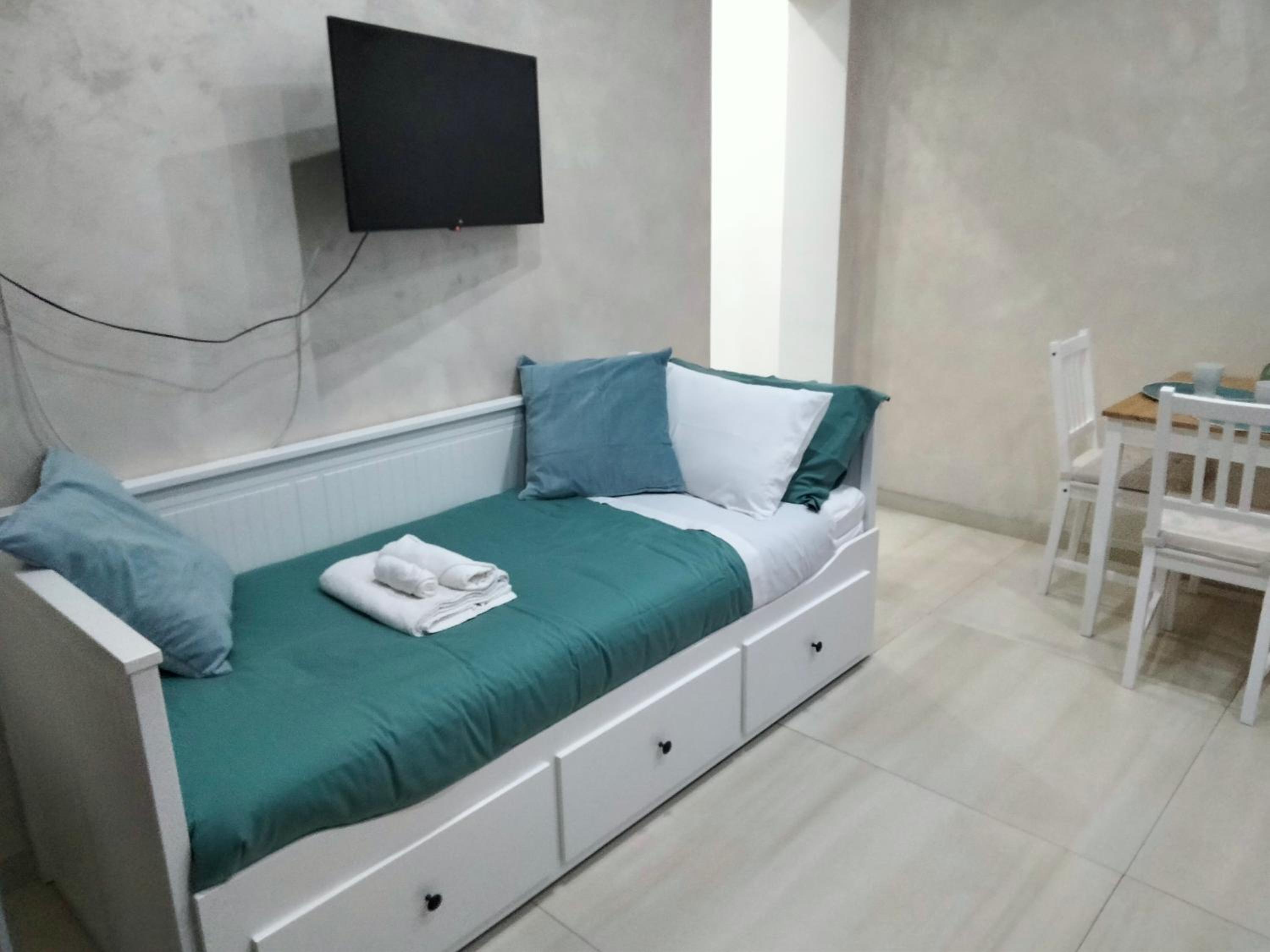 Deluxe Quadruple Room - Photo 4