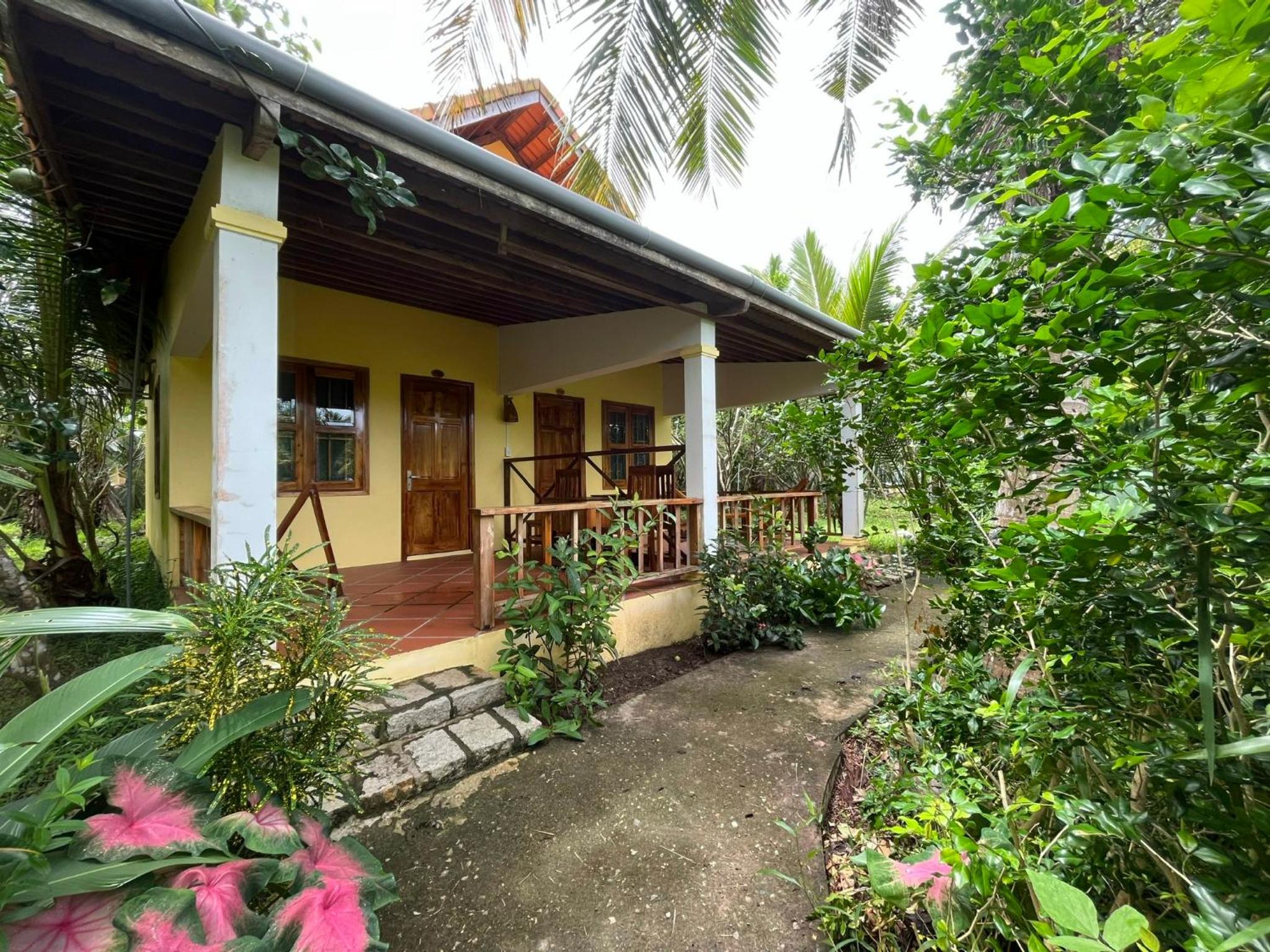 Triple Room with Garden View photo 2