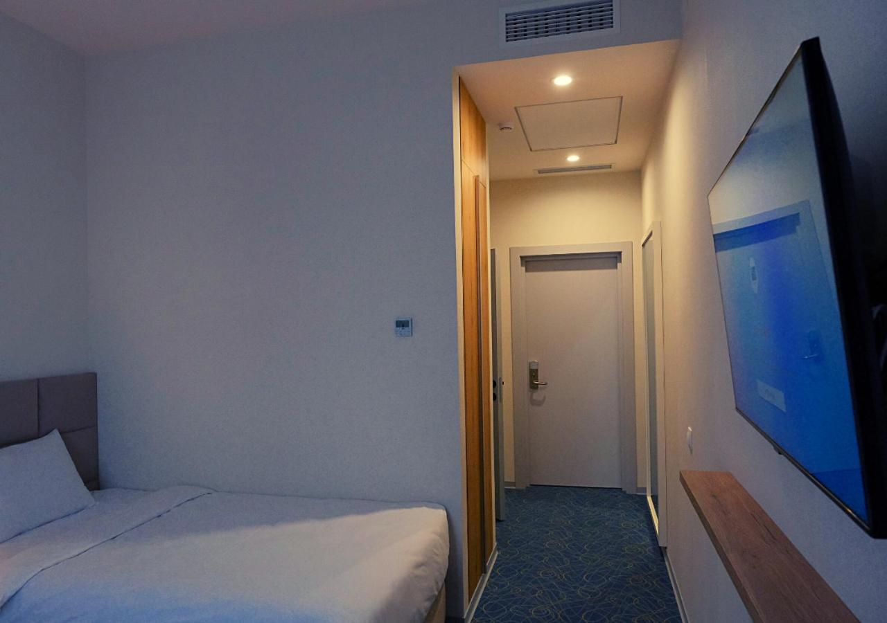 Standard Twin Room - Photo 3