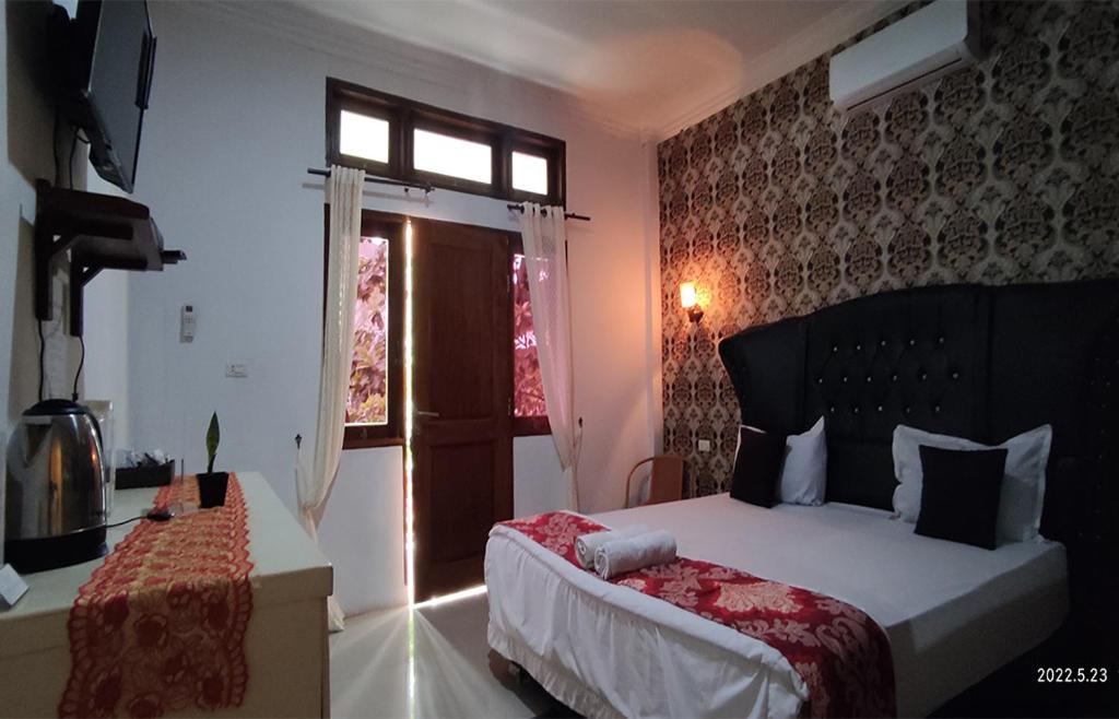 Deluxe Room - Photo 6