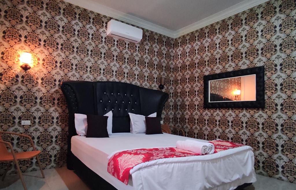 Deluxe Room - Photo 1