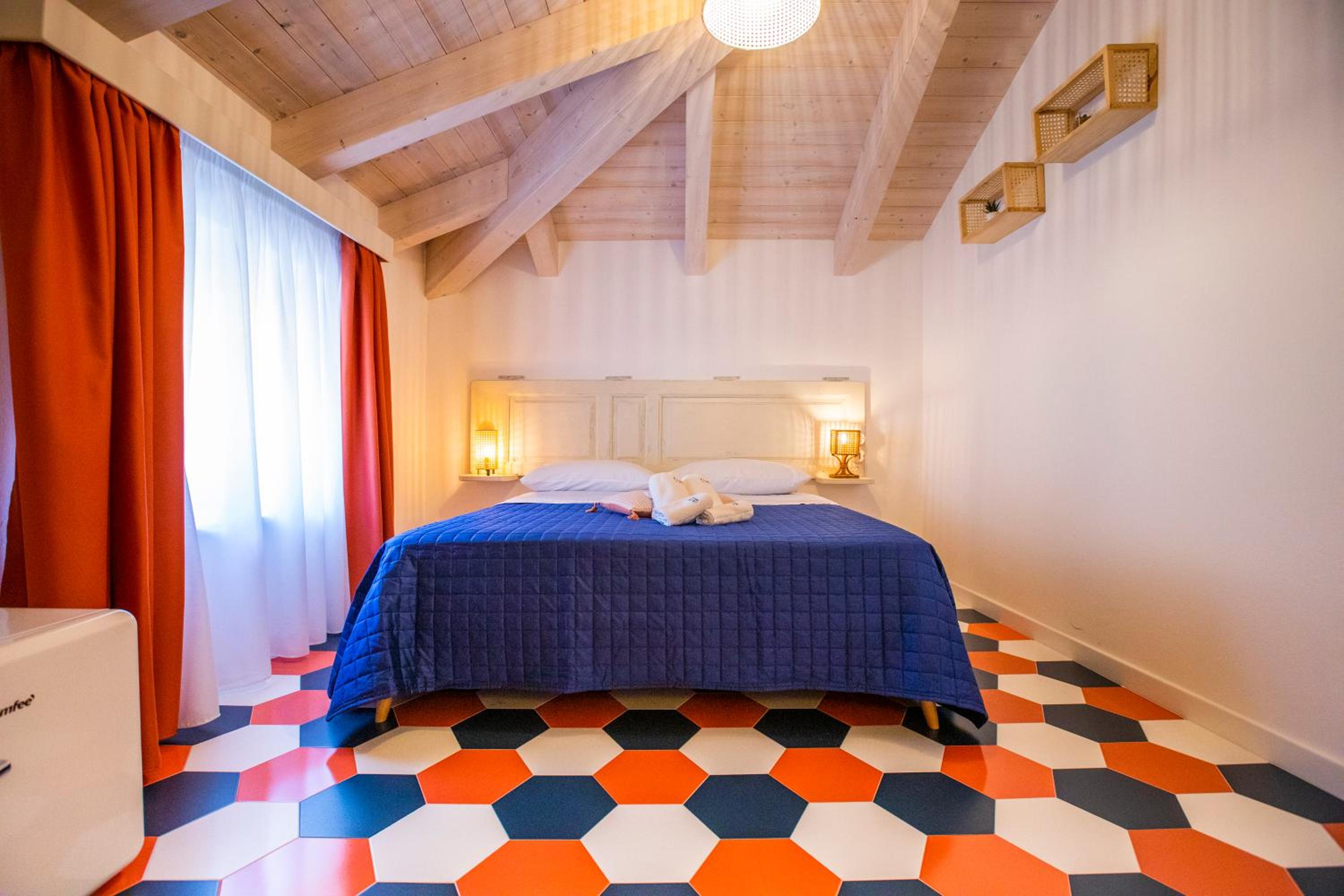 Quadruple Room with Balcony photo 2