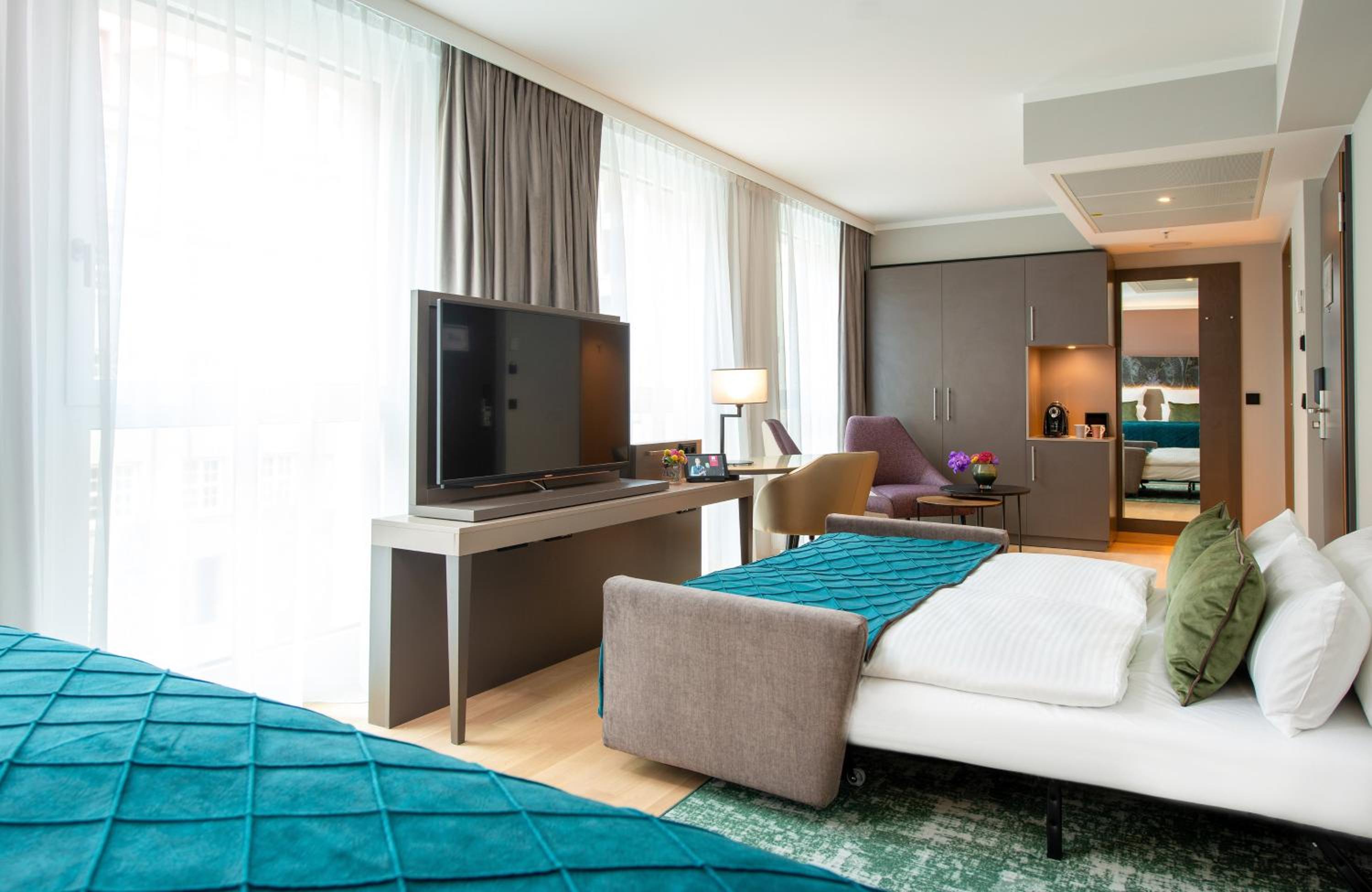 Deluxe Quadruple Room - Photo 1
