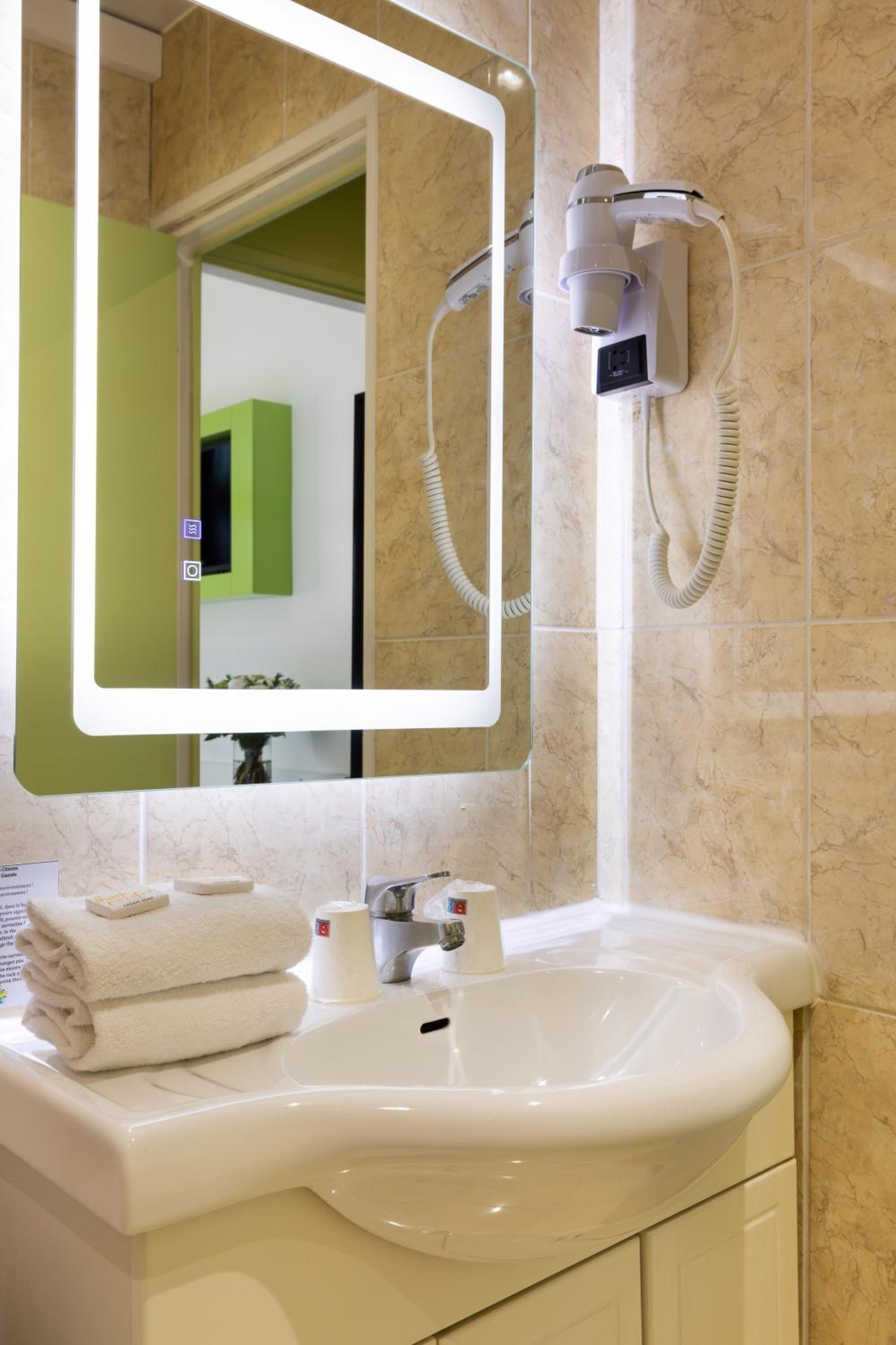 Relax in a sleek and modern bathroom oasis.
