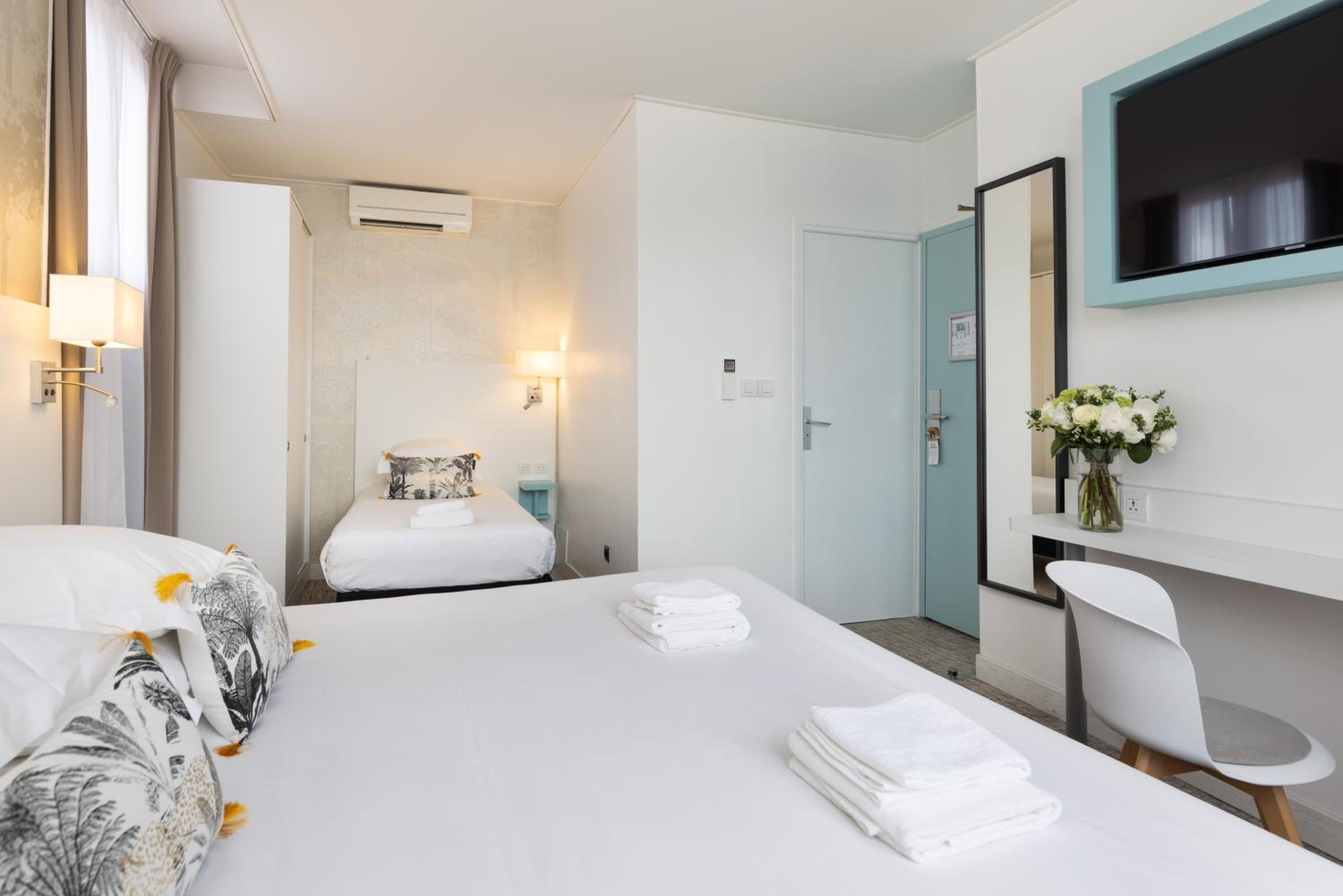 Experience comfort in our stylish hotel room retreat.