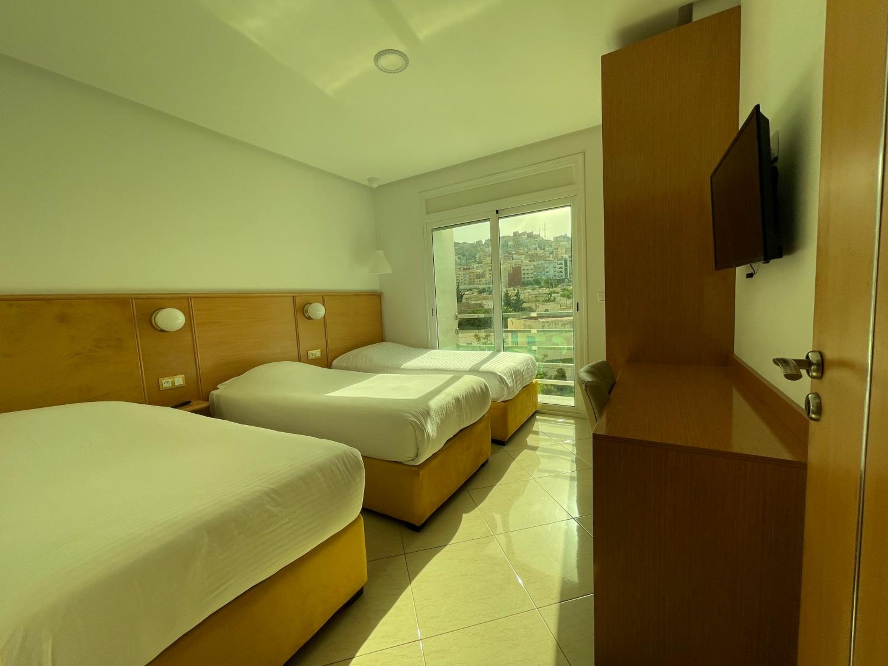 Three-Bedroom Apartment - Photo 1