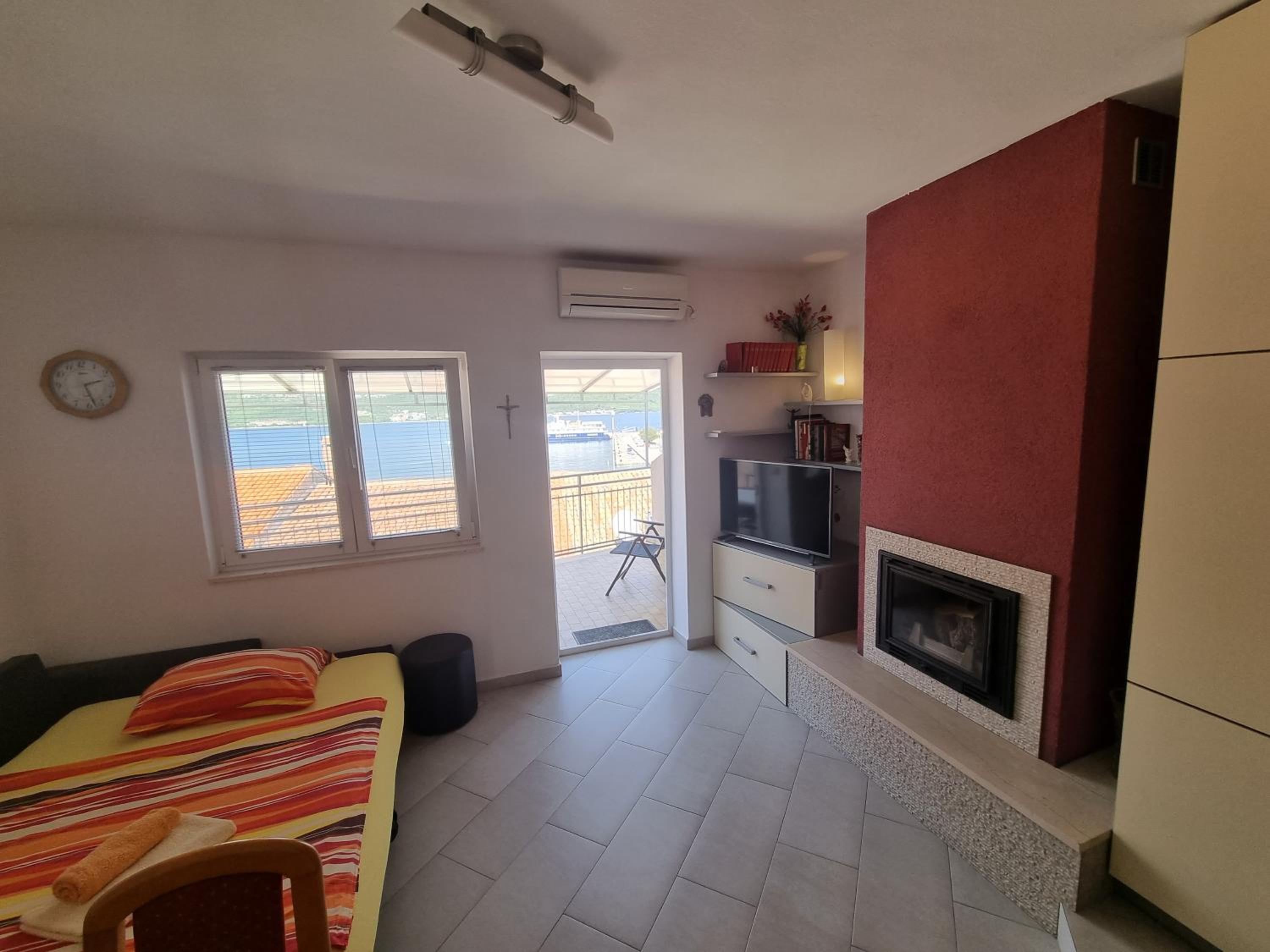 One-Bedroom Apartment with Balcony and Sea View