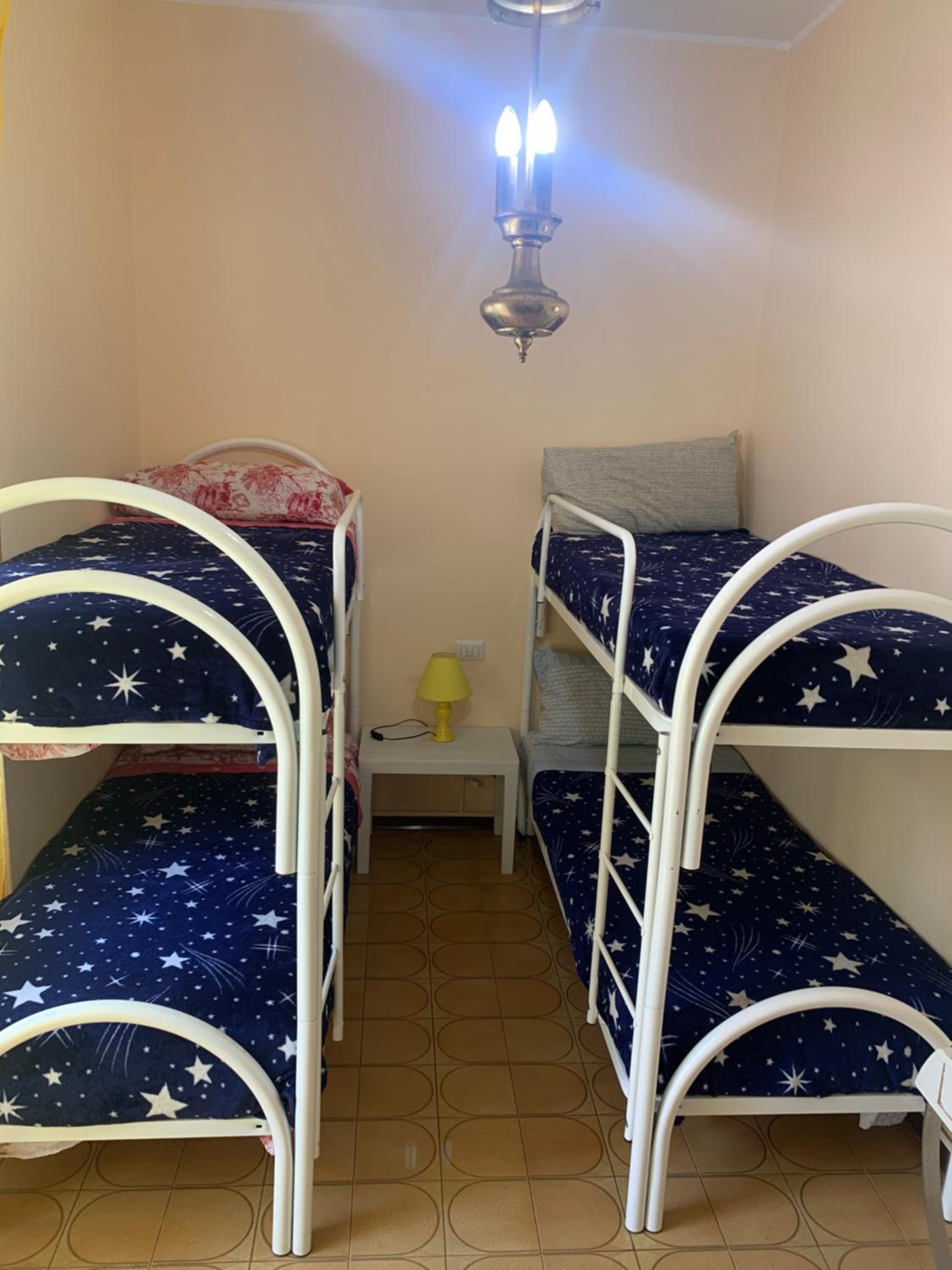 Quadruple Room with Shared Bathroom
