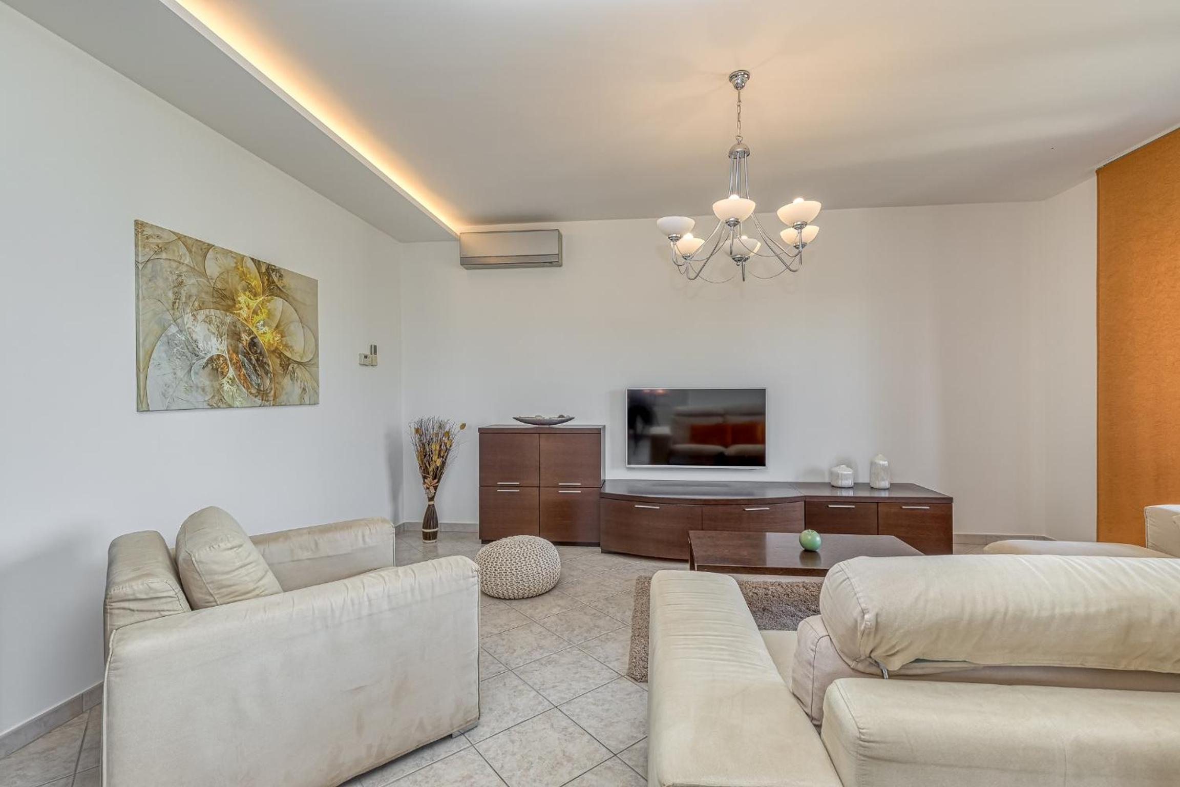 Three-Bedroom Apartment photo 1