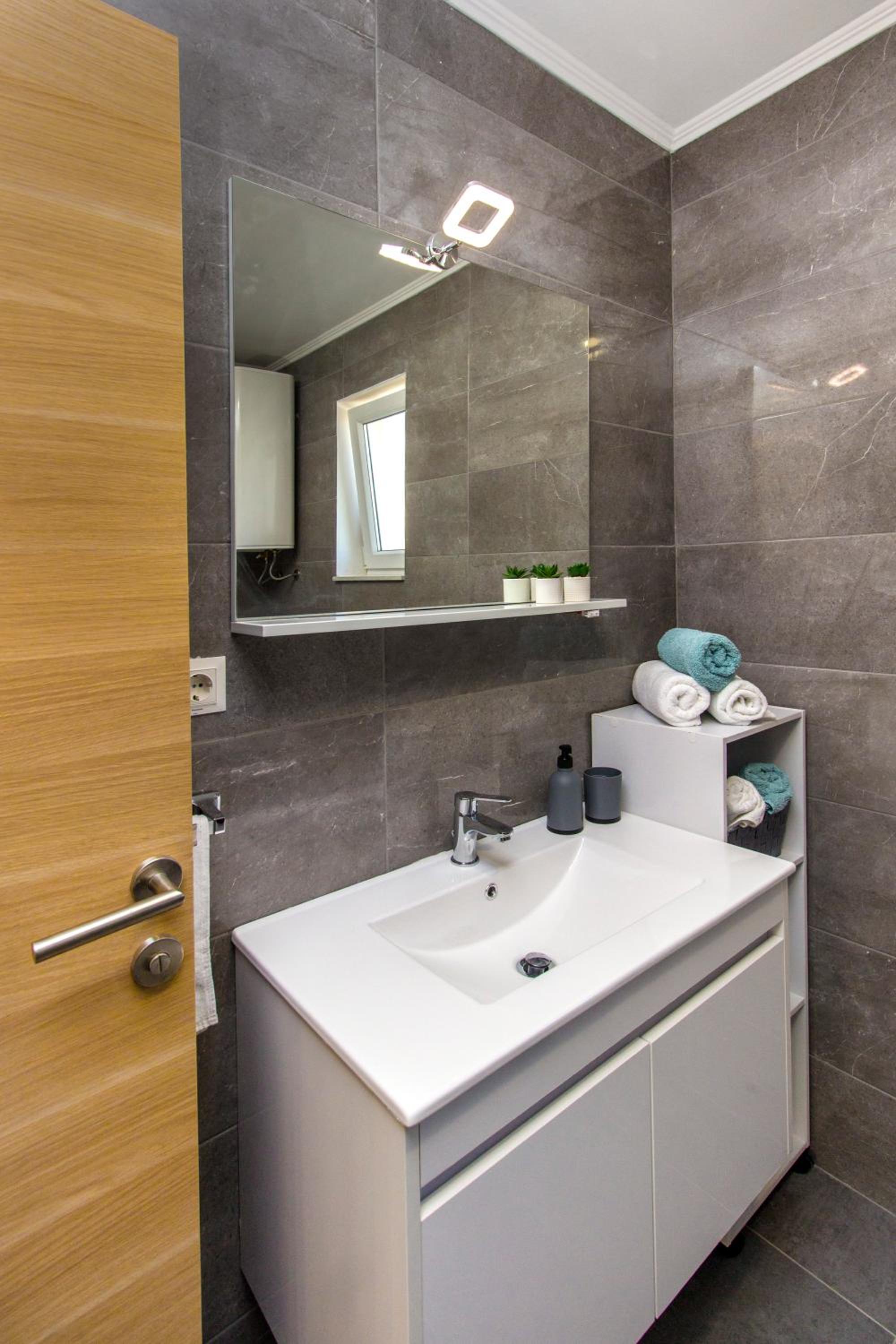 Three-Bedroom House - Photo 12