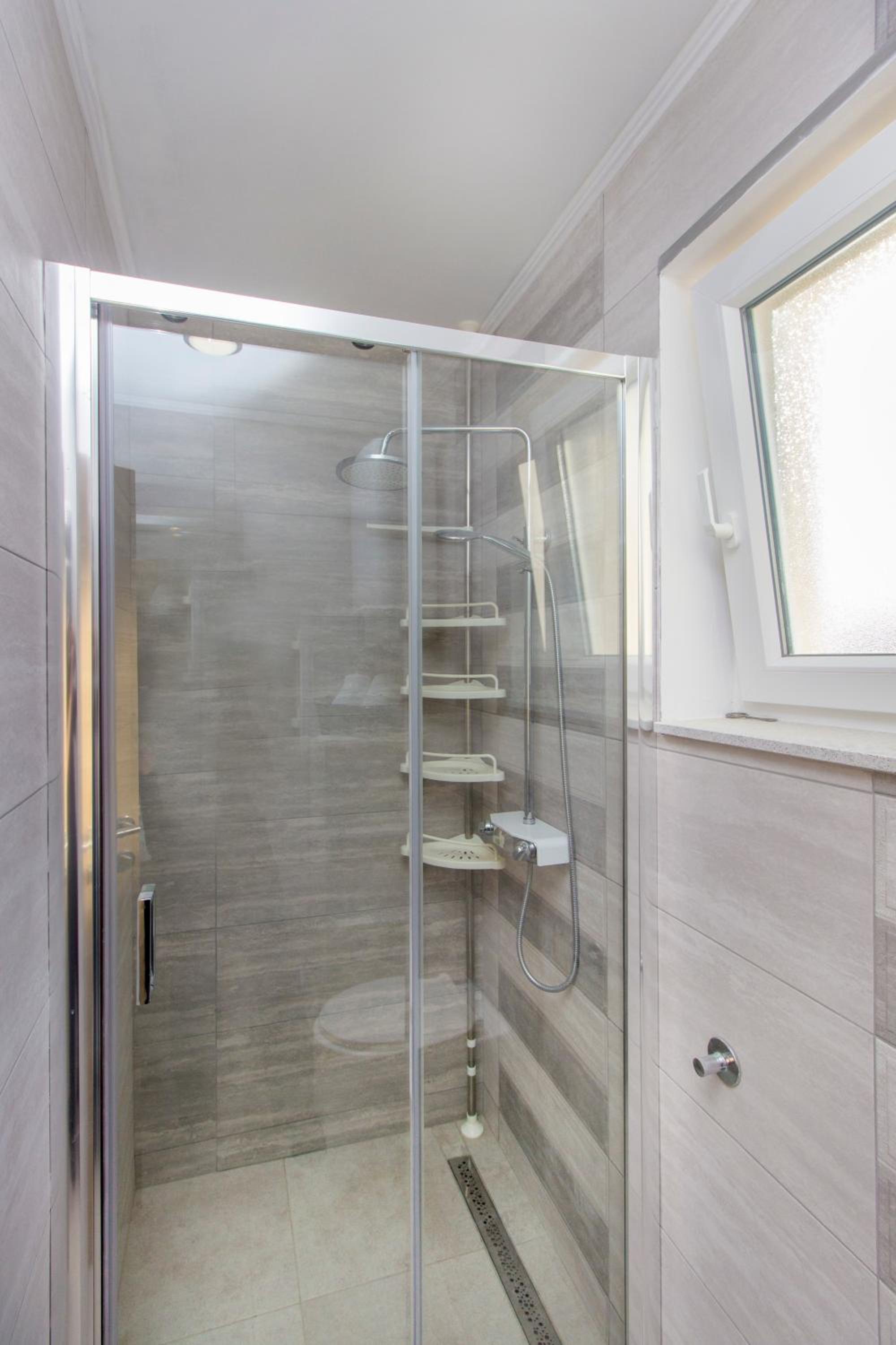 Three-Bedroom House - Photo 17