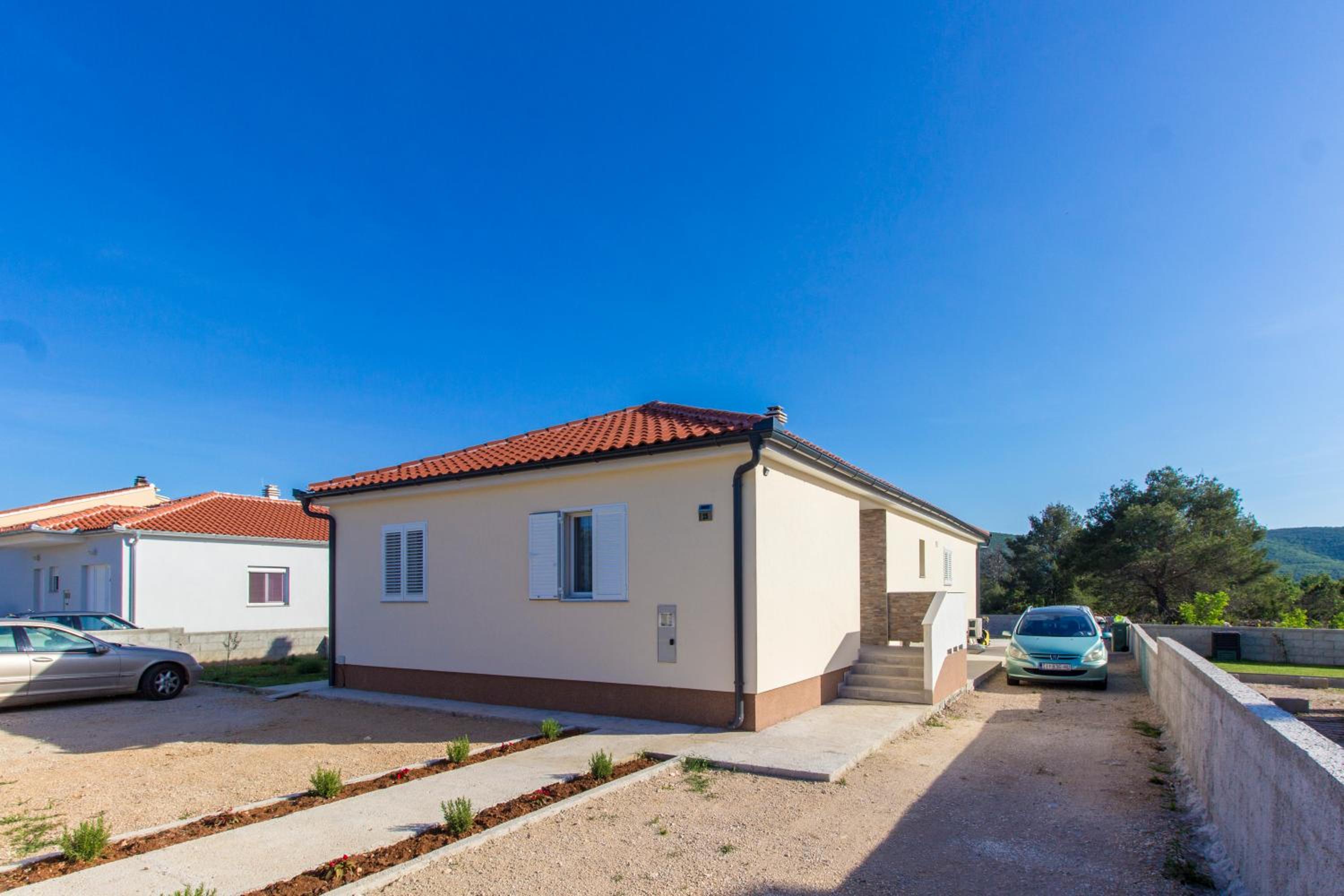Three-Bedroom House - Photo 30