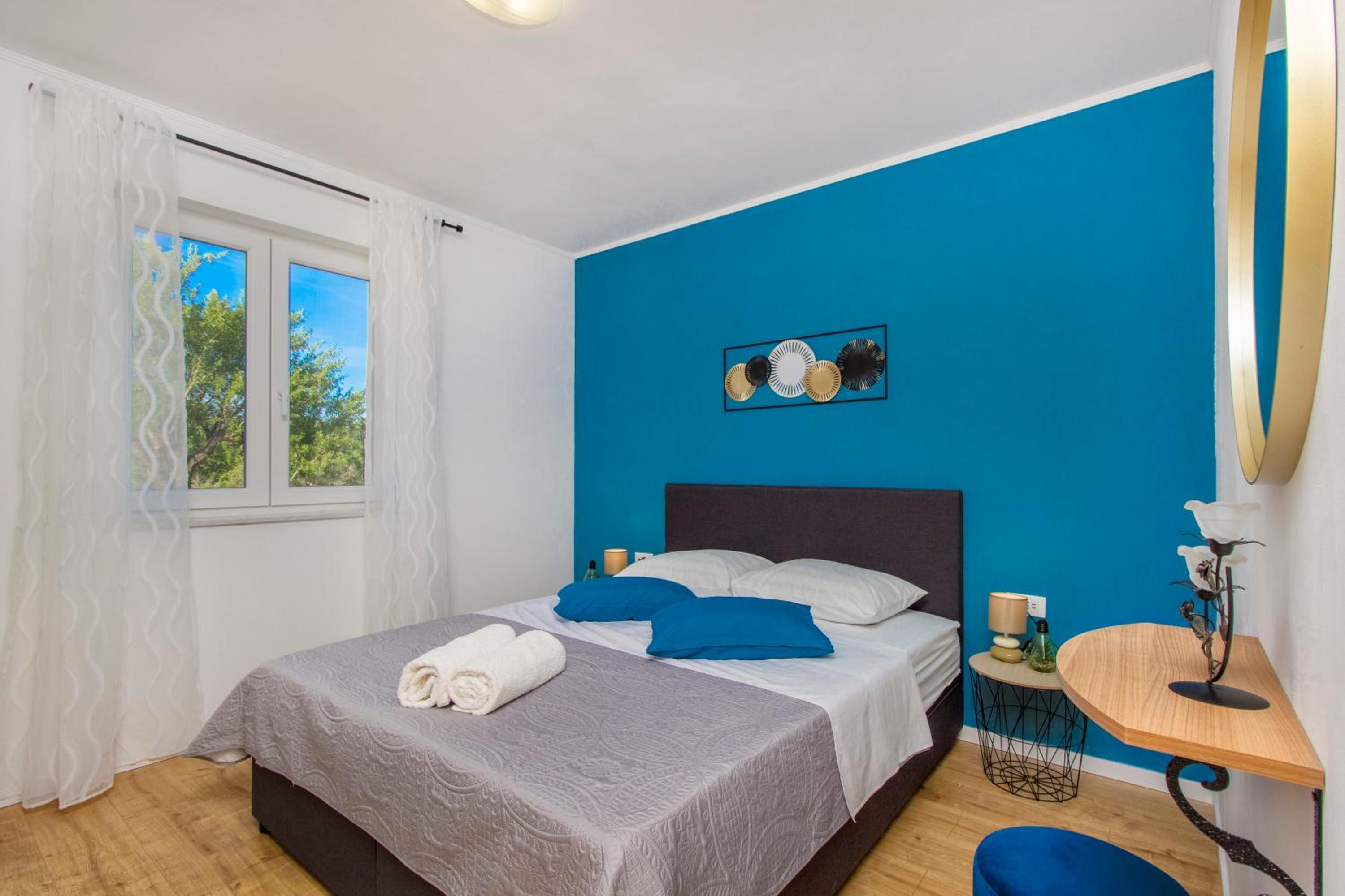 Three-Bedroom House - Photo 27