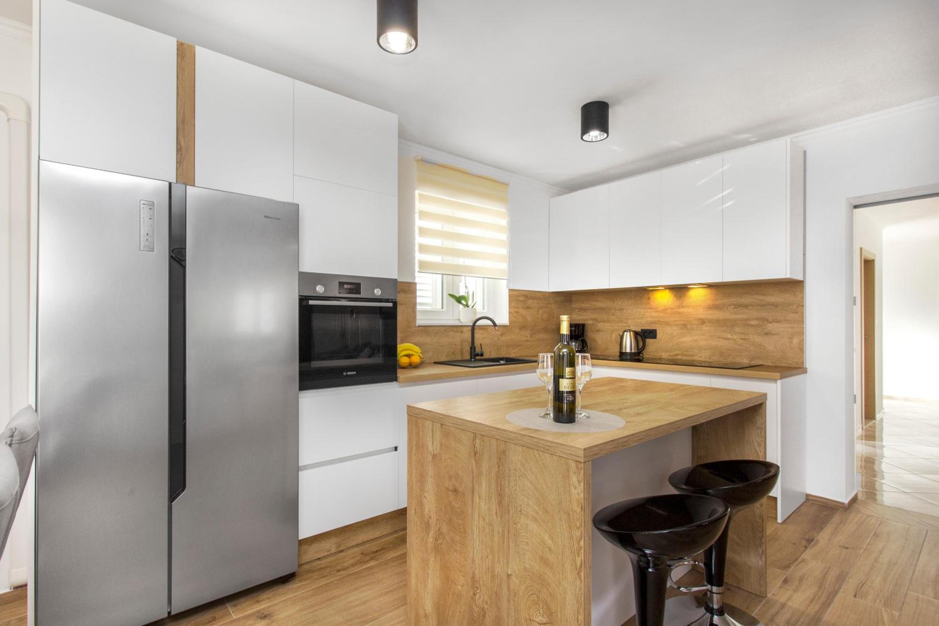 Three-Bedroom House - Photo 26