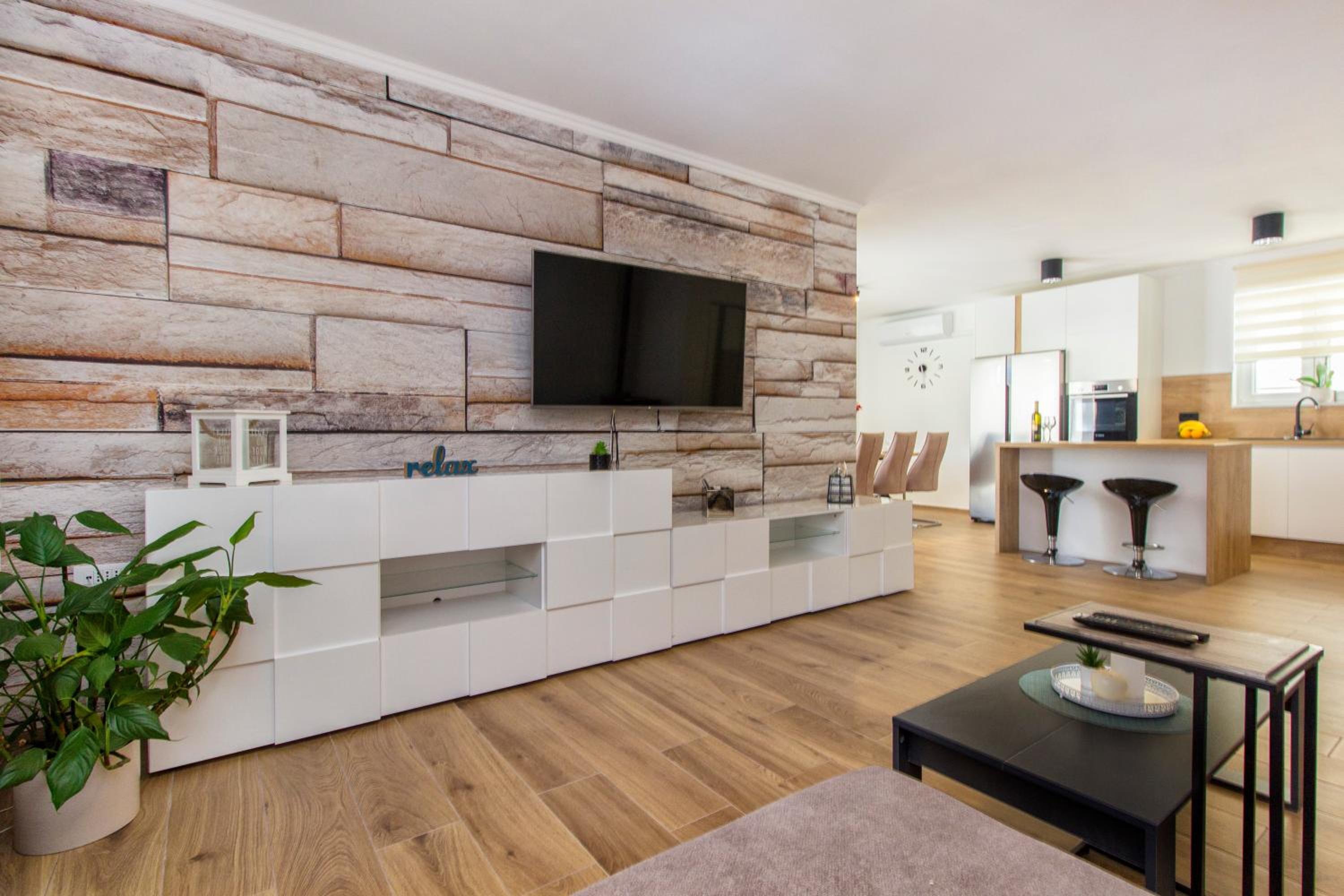 Three-Bedroom House - Photo 25