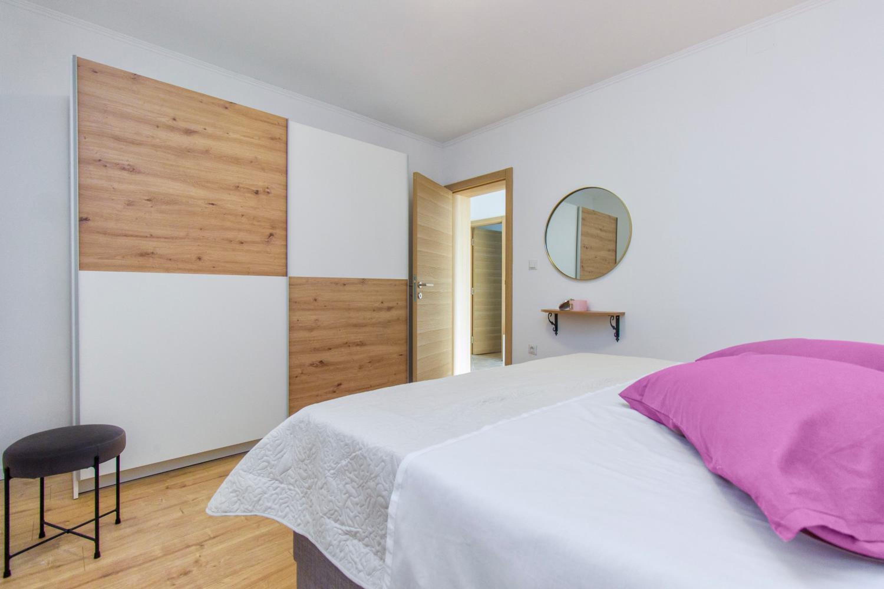 Three-Bedroom House - Photo 24