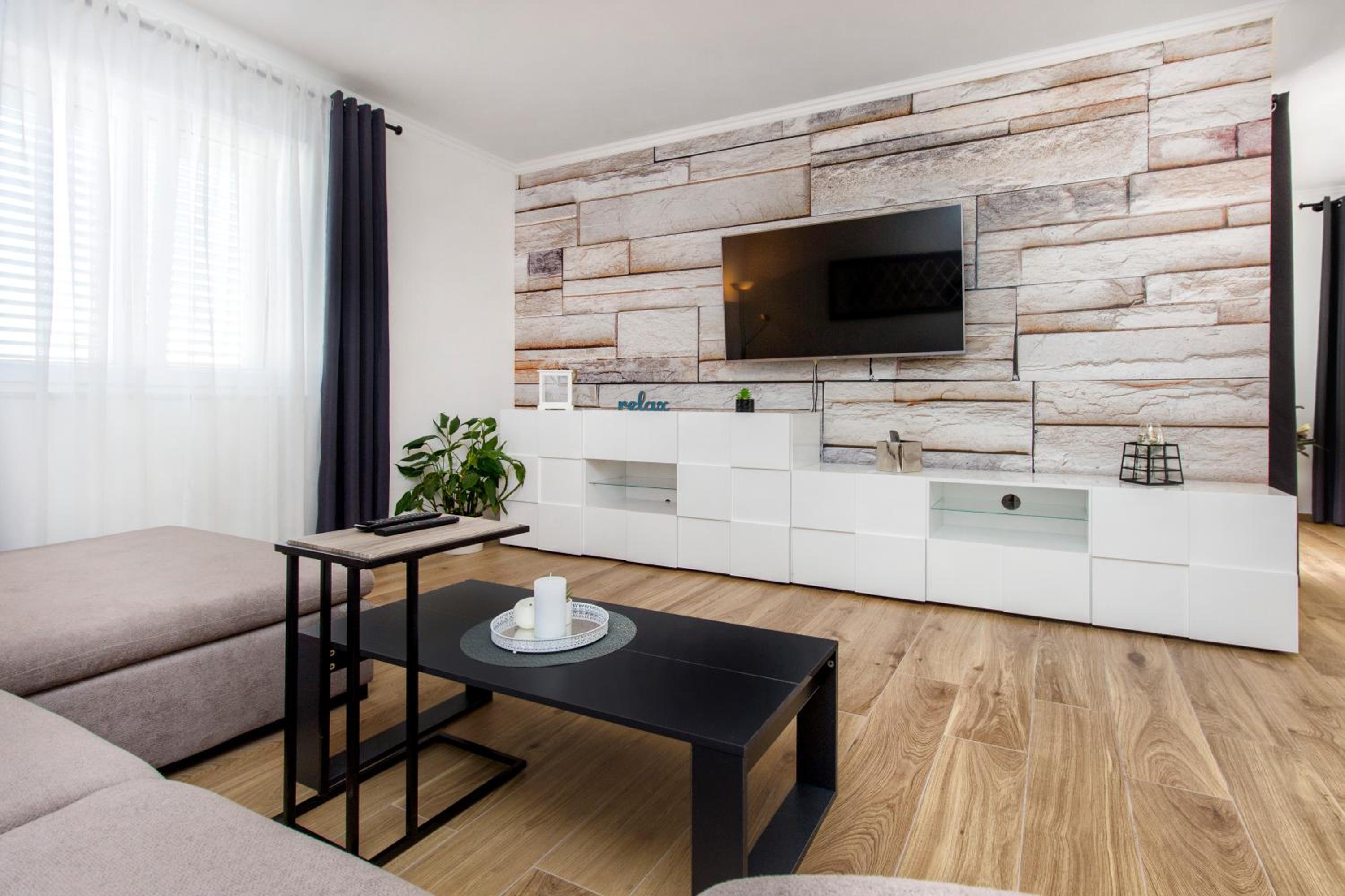 Three-Bedroom House - Photo 23