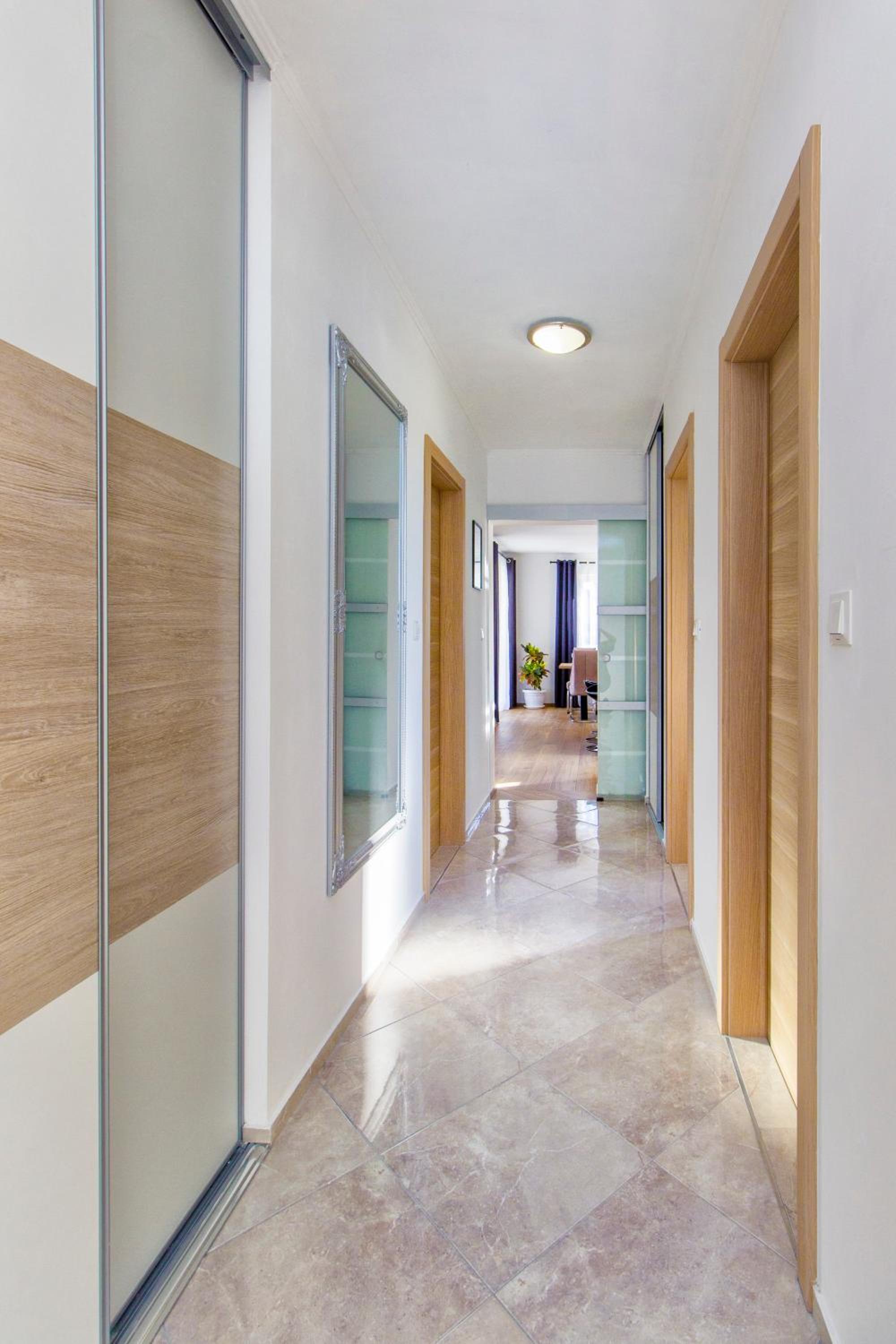Three-Bedroom House - Photo 16