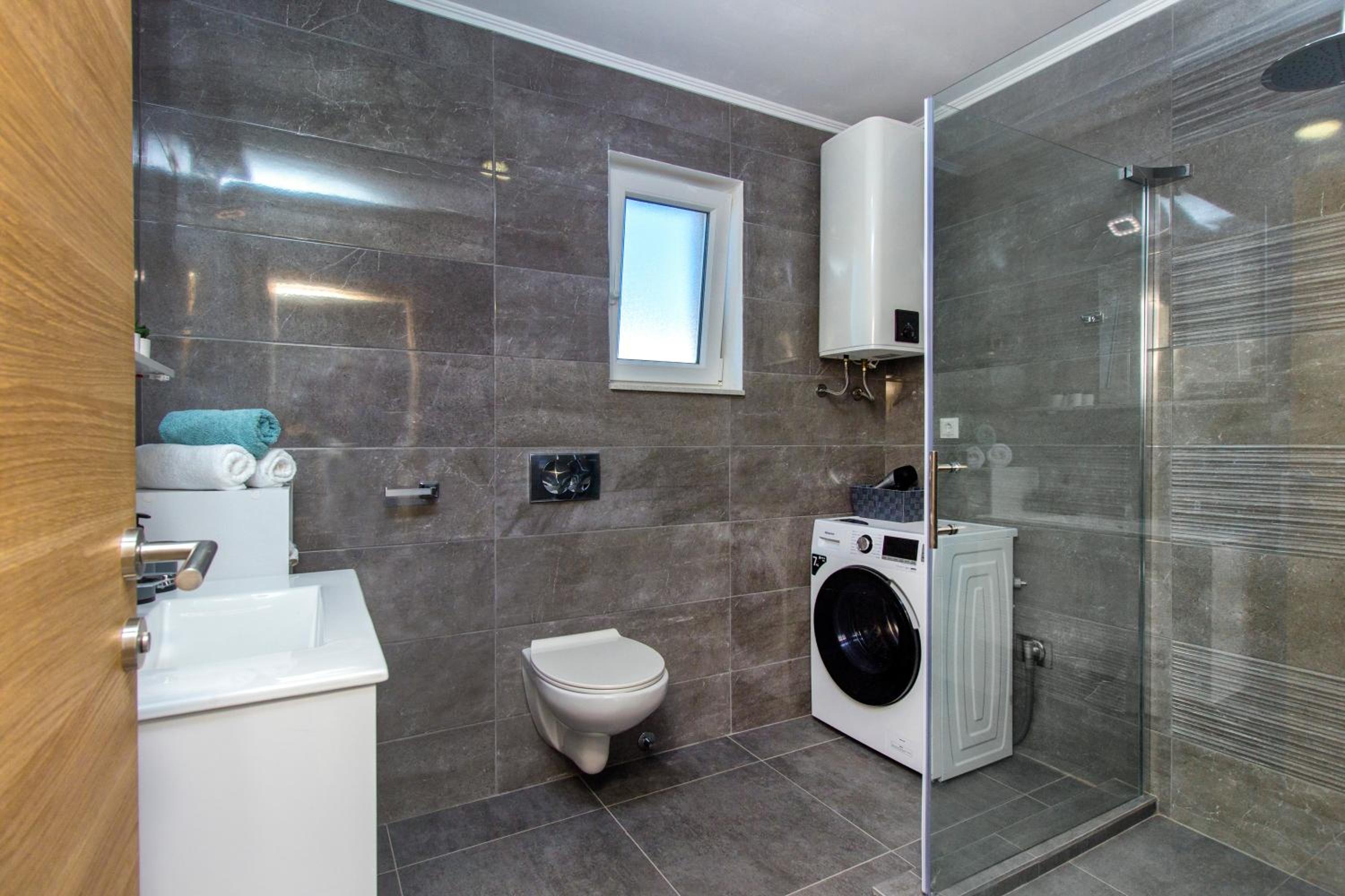 Three-Bedroom House - Photo 42