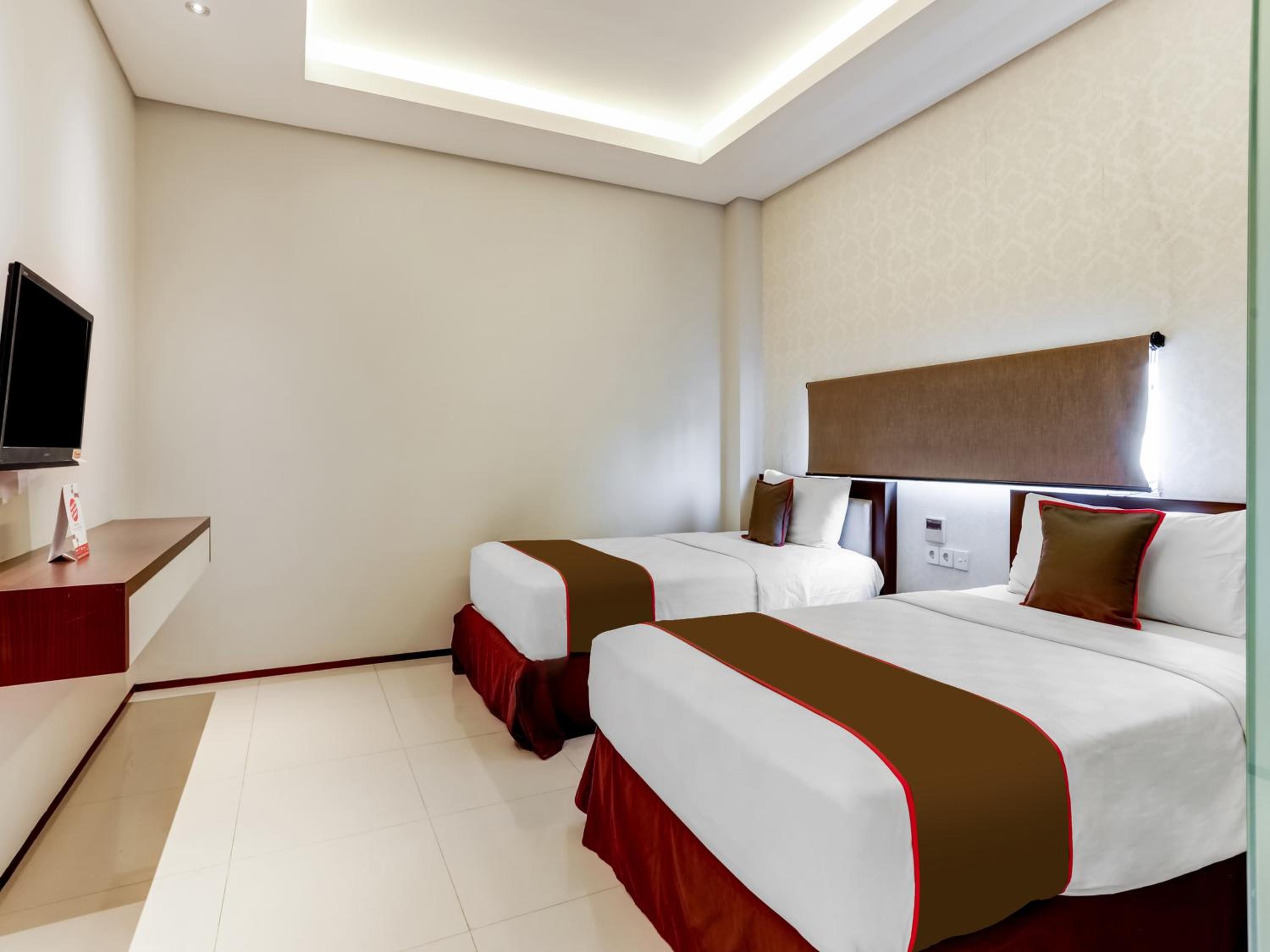 Delxue Twin Room - Photo 4