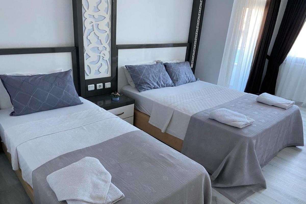 Standard Triple Room - Photo 7