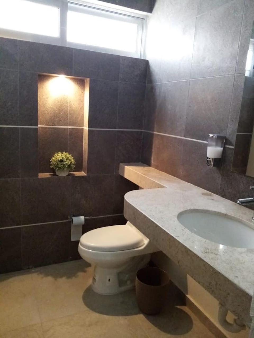 Three-Bedroom House - Photo 26