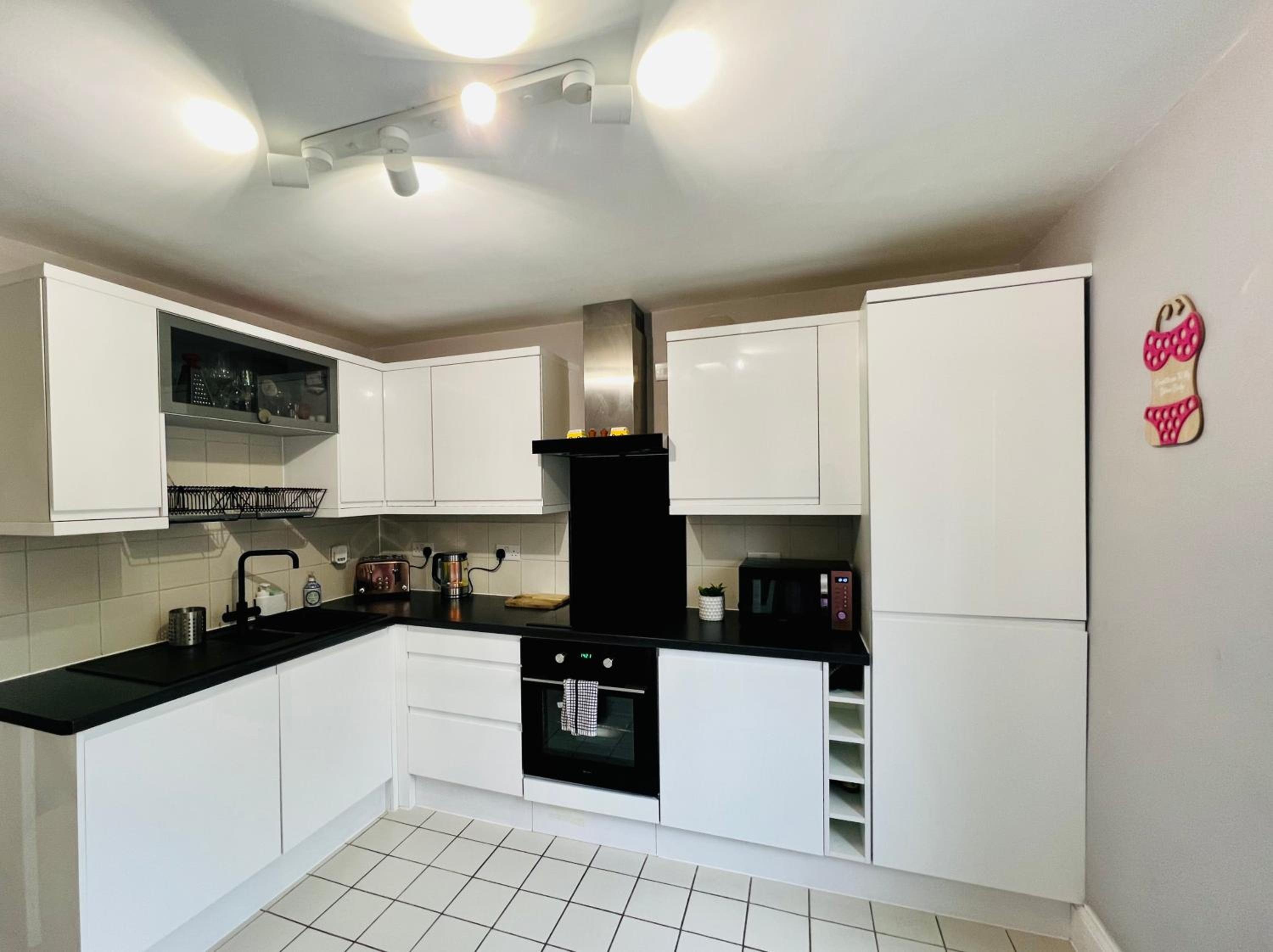 Three-Bedroom Apartment - Photo 3