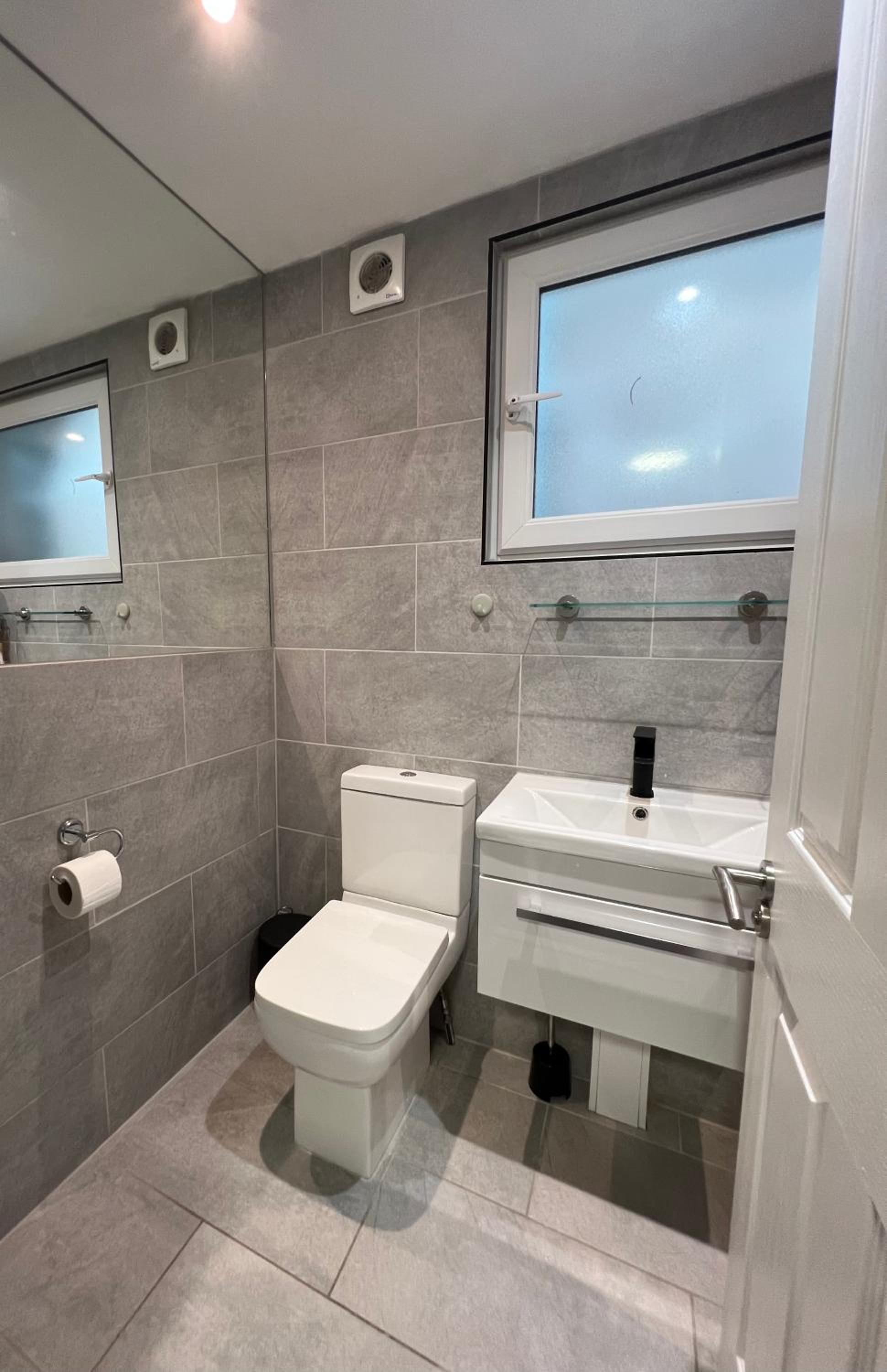 Three-Bedroom Apartment - Photo 10