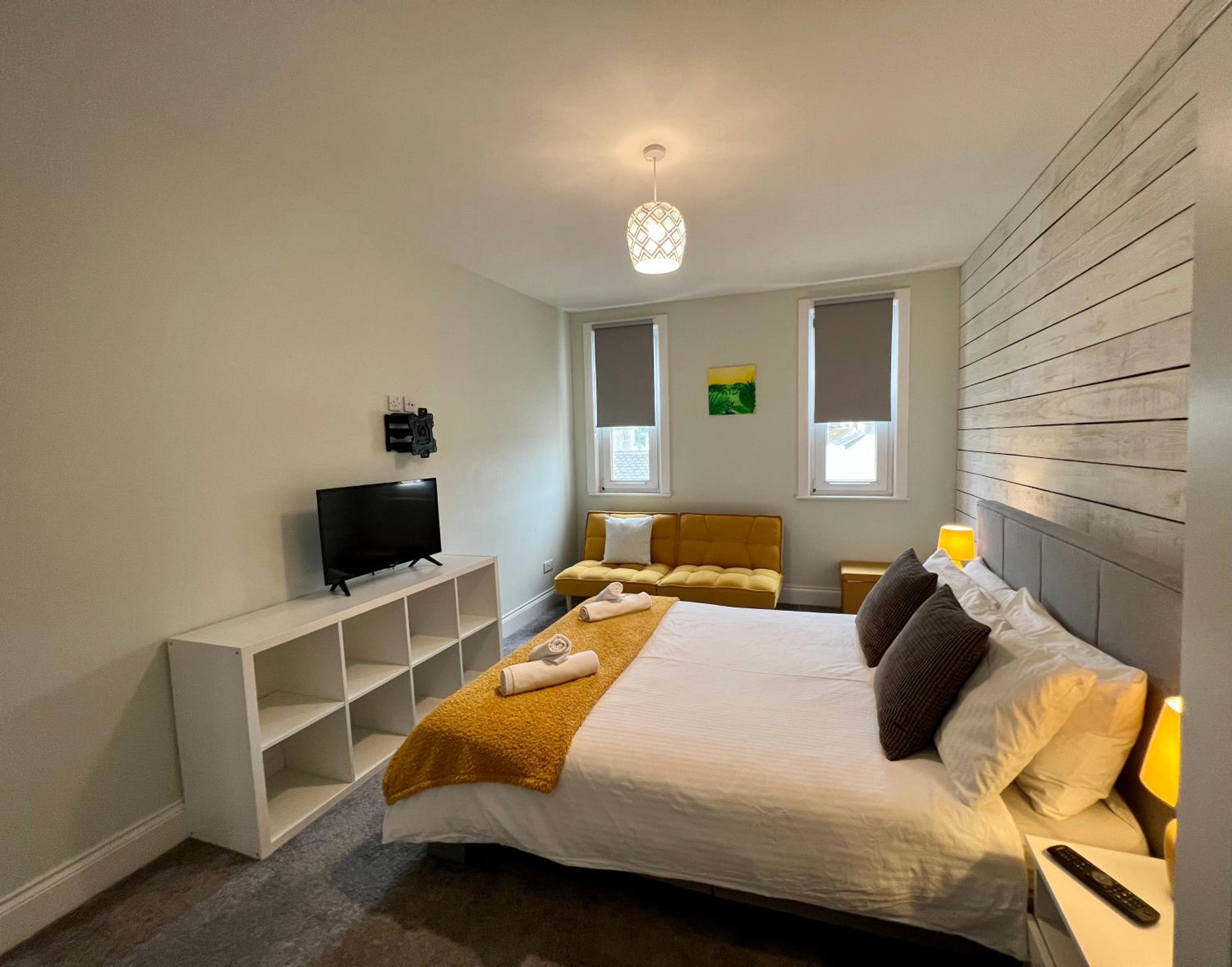 Three-Bedroom Apartment - Photo 16