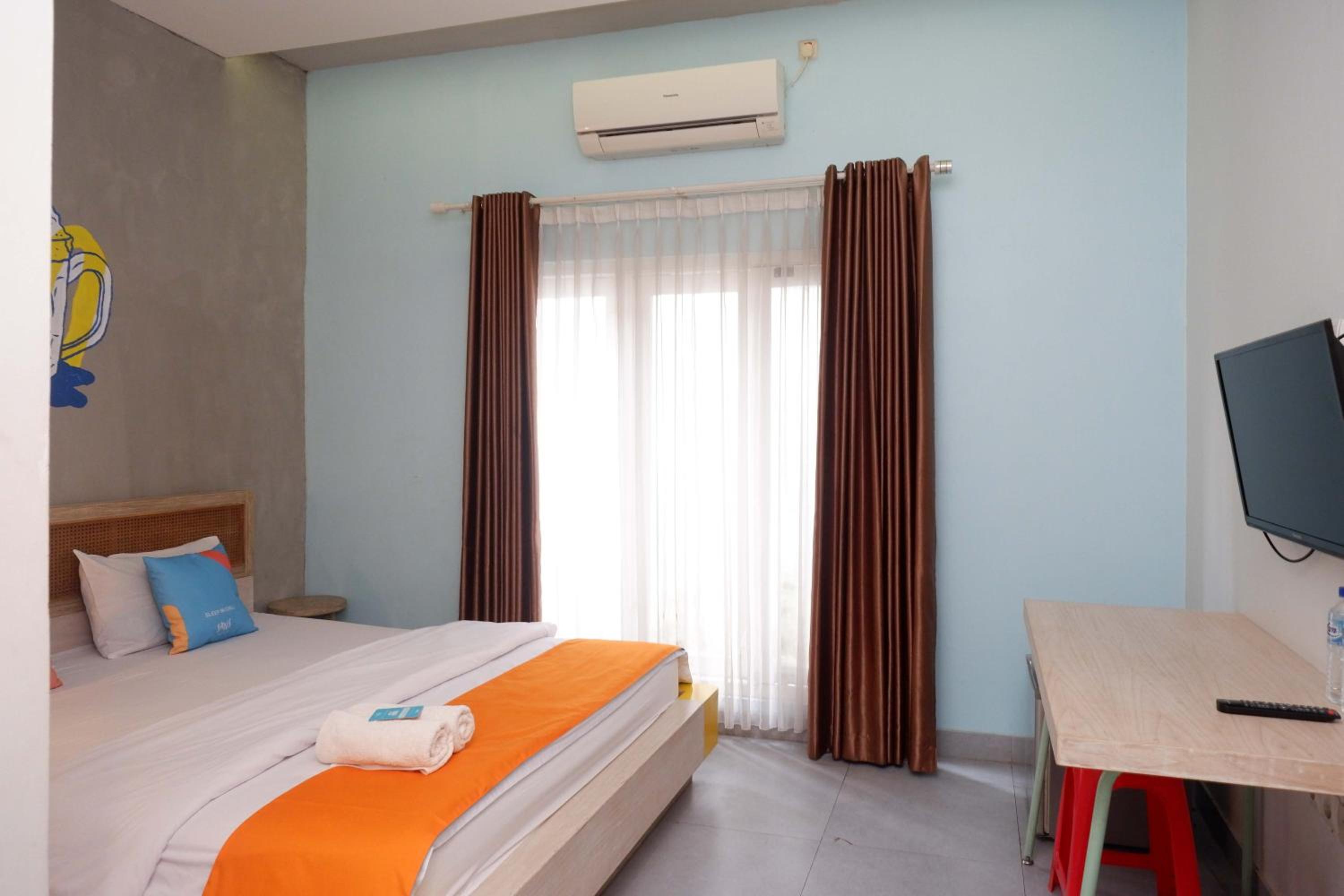 Deluxe Room - Photo 20