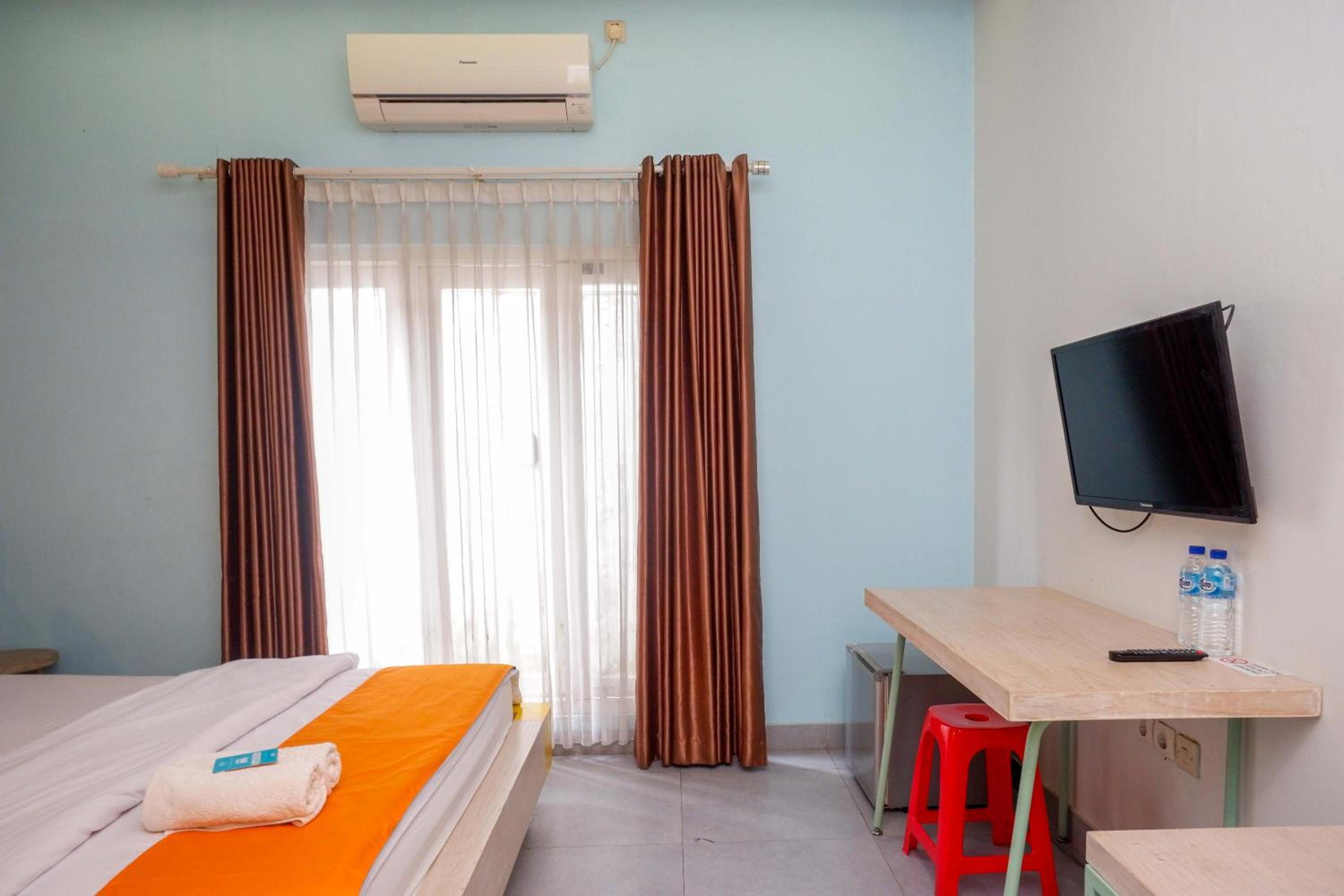 Deluxe Room - Photo 8