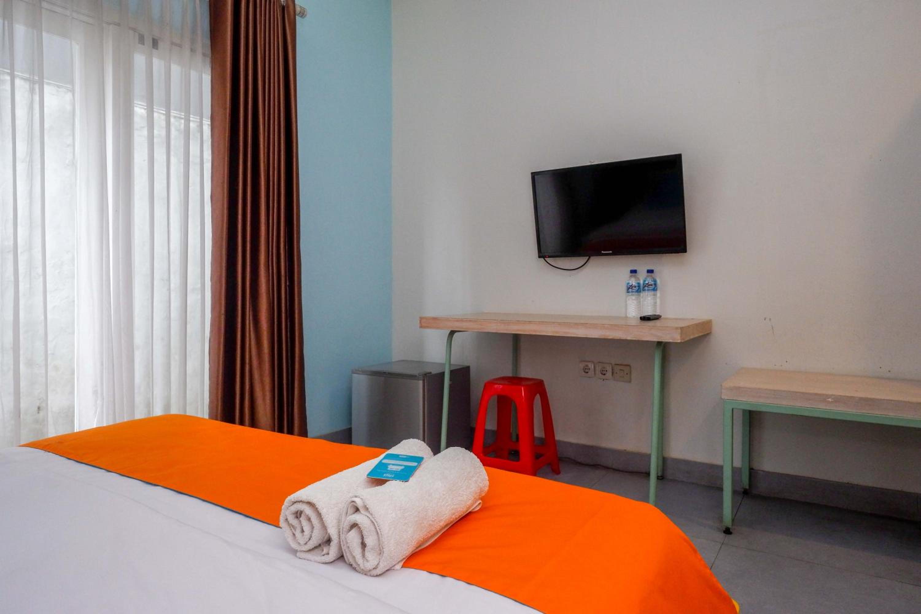 Deluxe Room - Photo 5