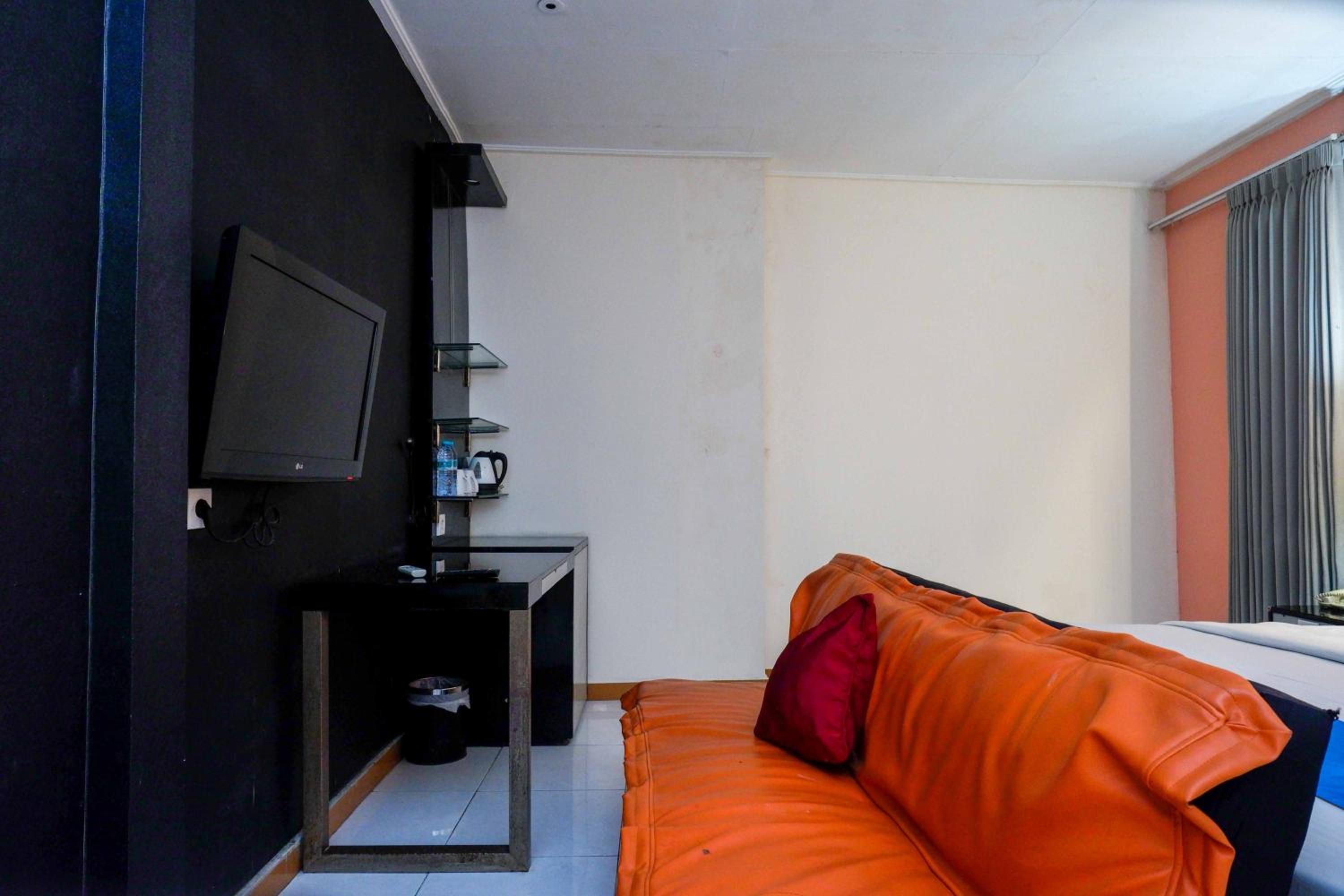 Deluxe Room - Photo 11
