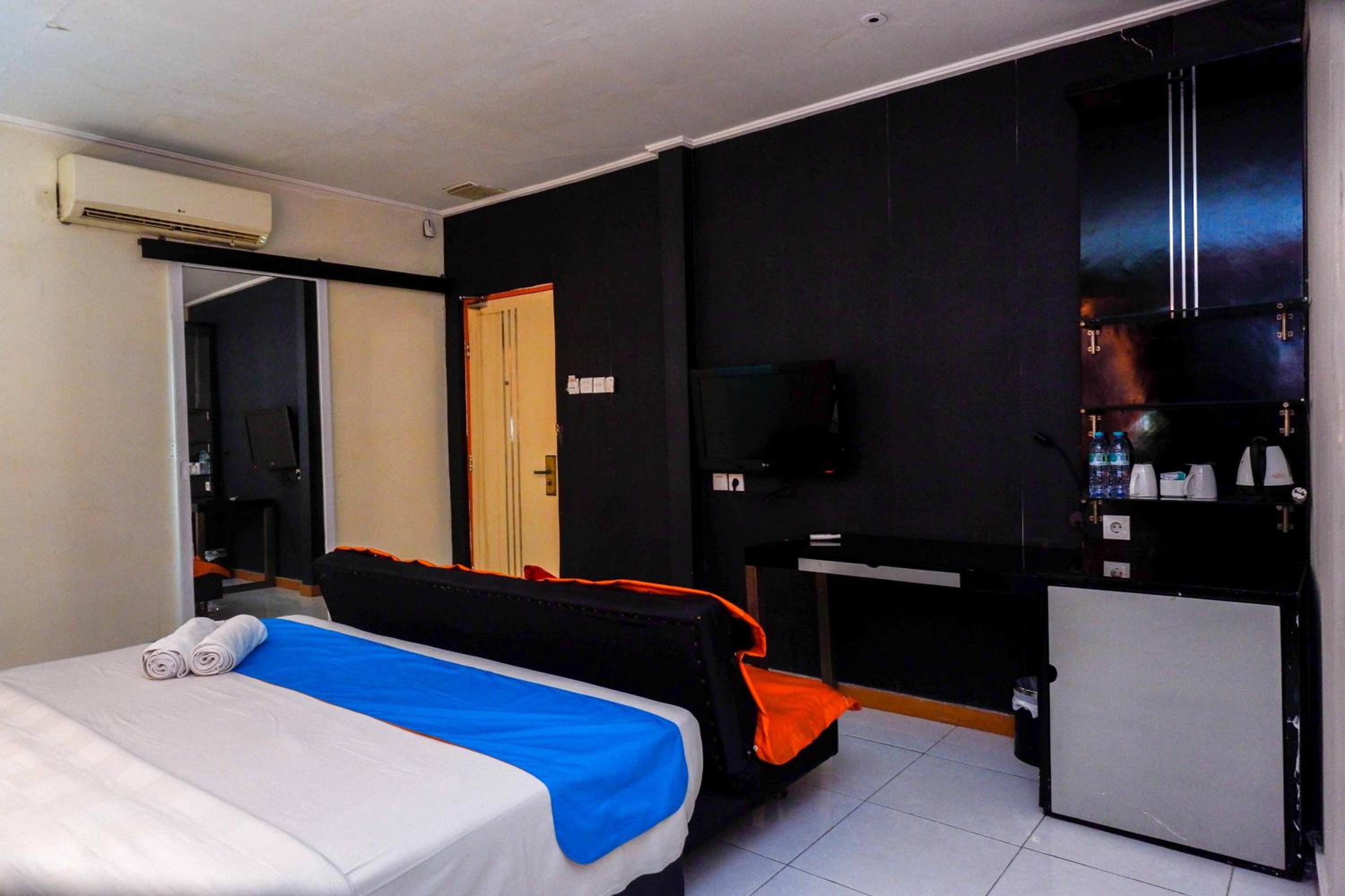 Deluxe Room - Photo 7