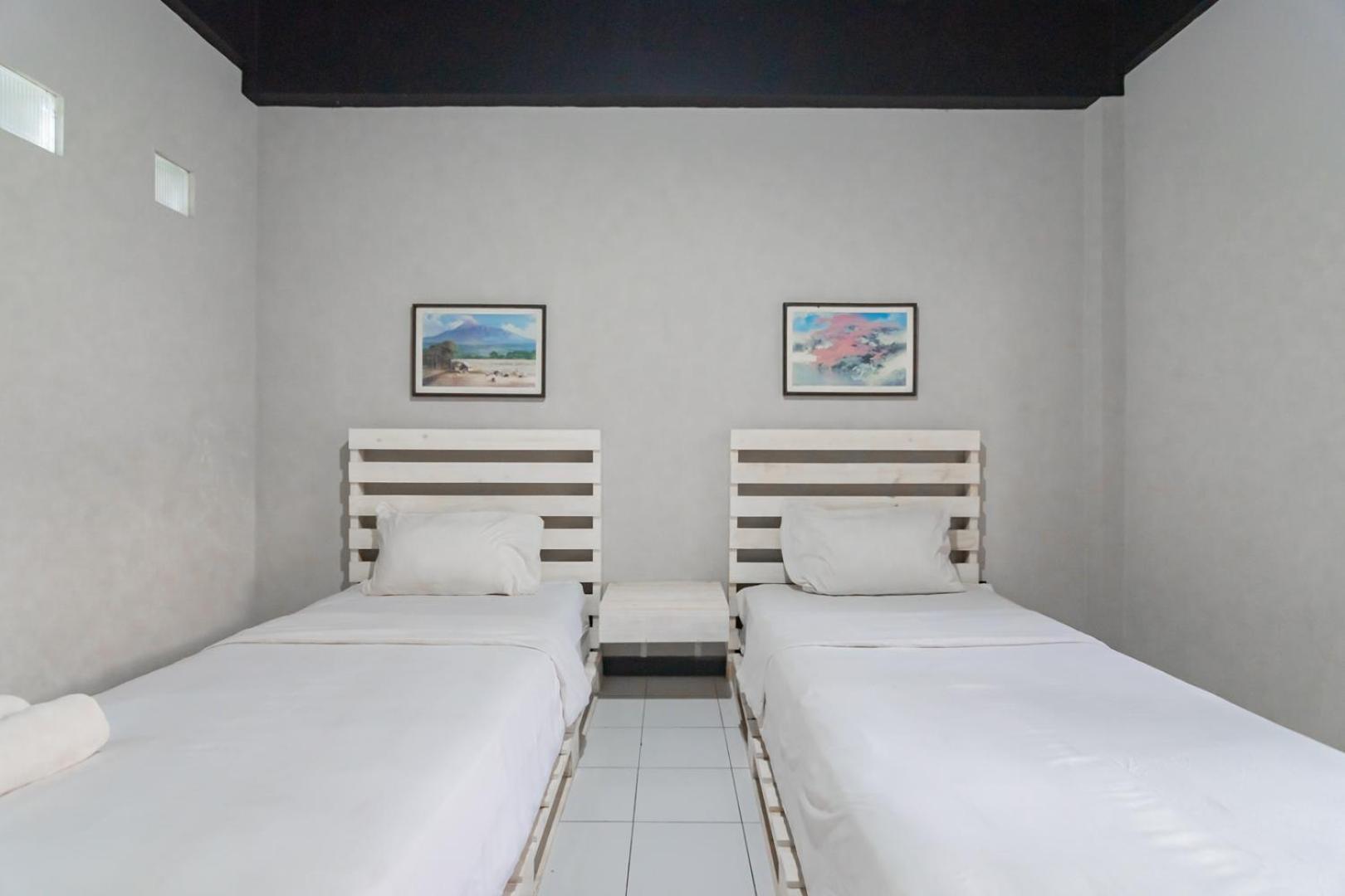 Twin Room - Photo 8