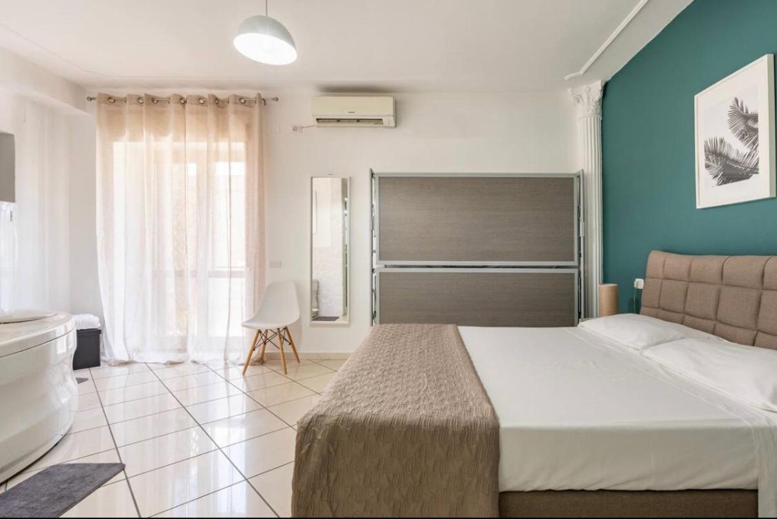 Deluxe Quadruple Room - Photo 5