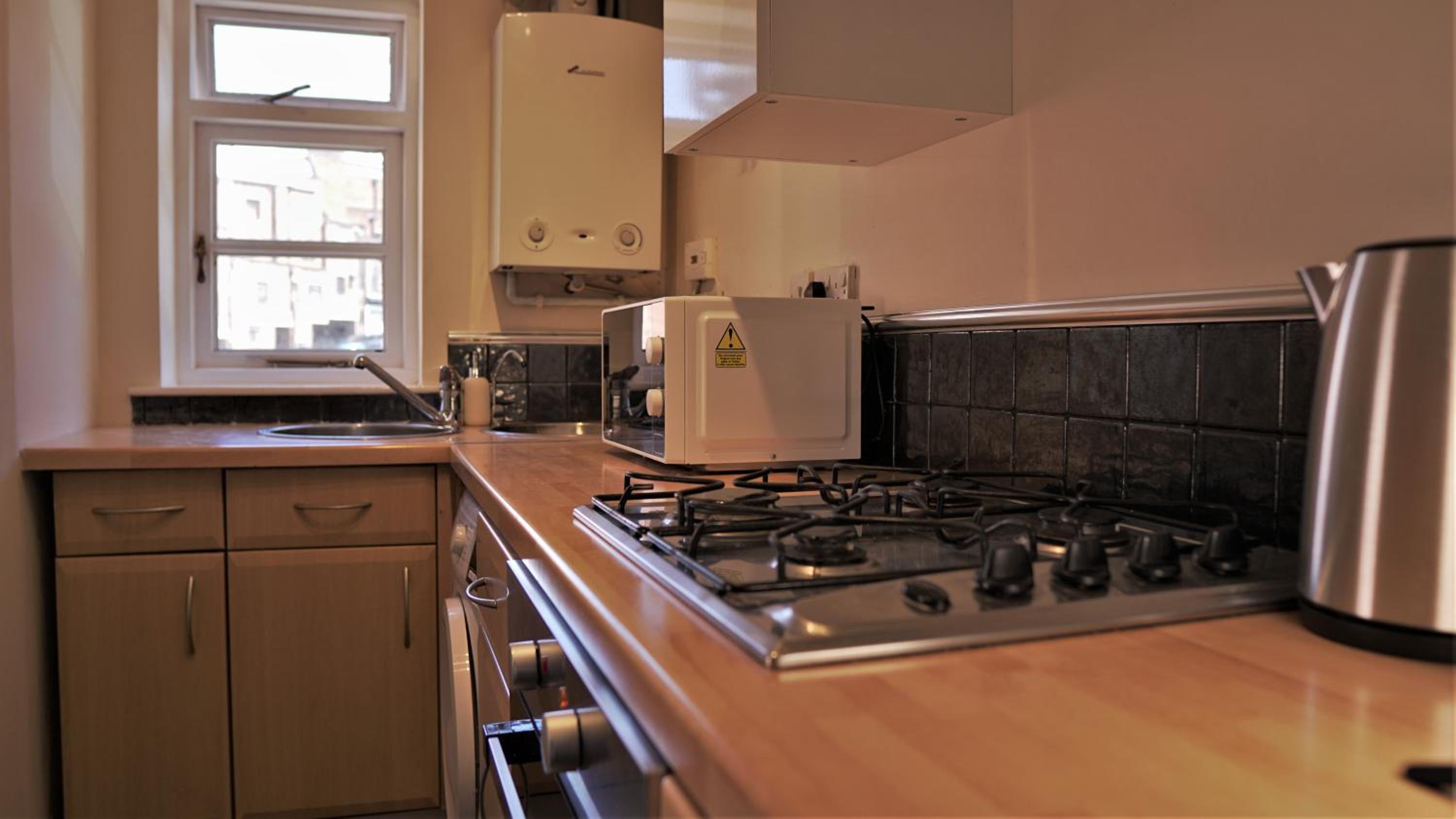 Two-Bedroom Apartment - Photo 13
