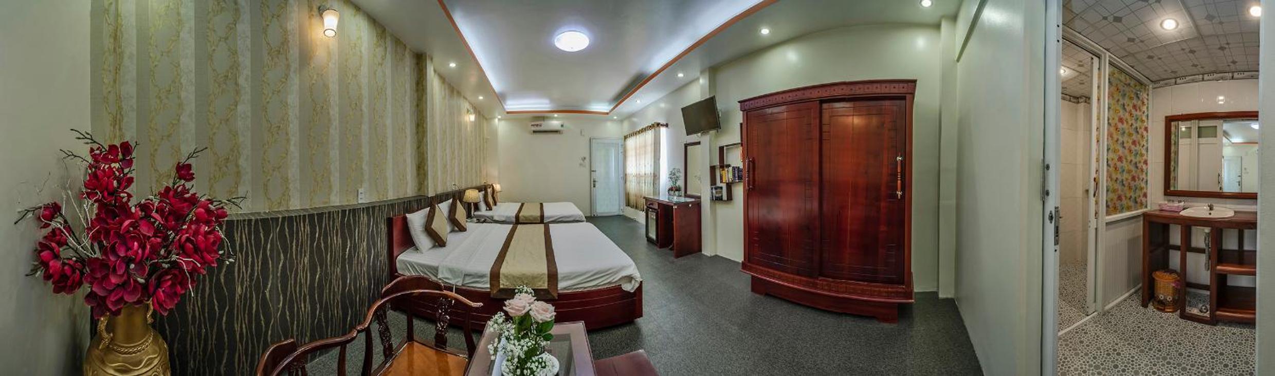 Luxury Quadruple Room - Photo 8