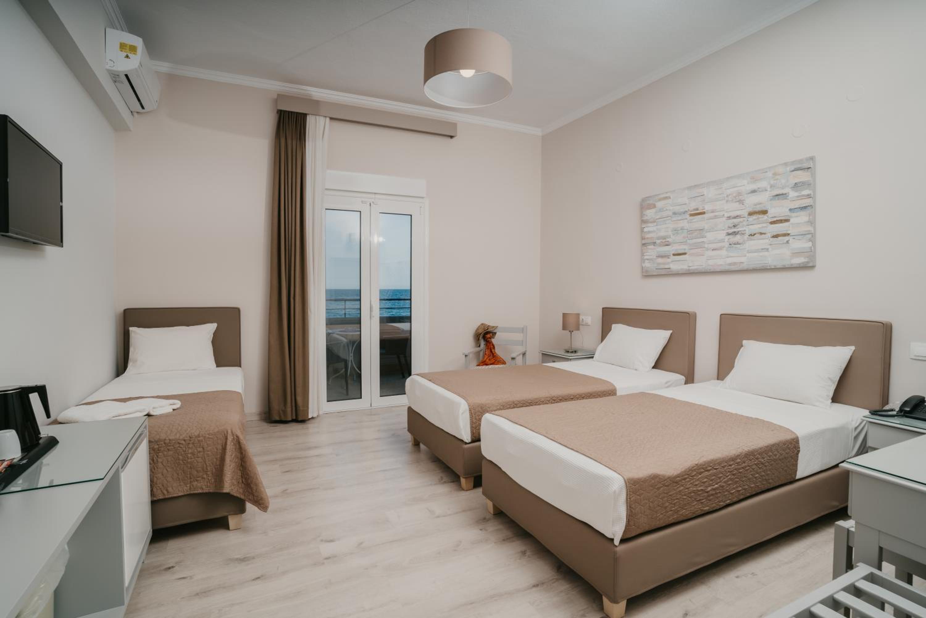 Superior Triple Room with Sea View photo 1