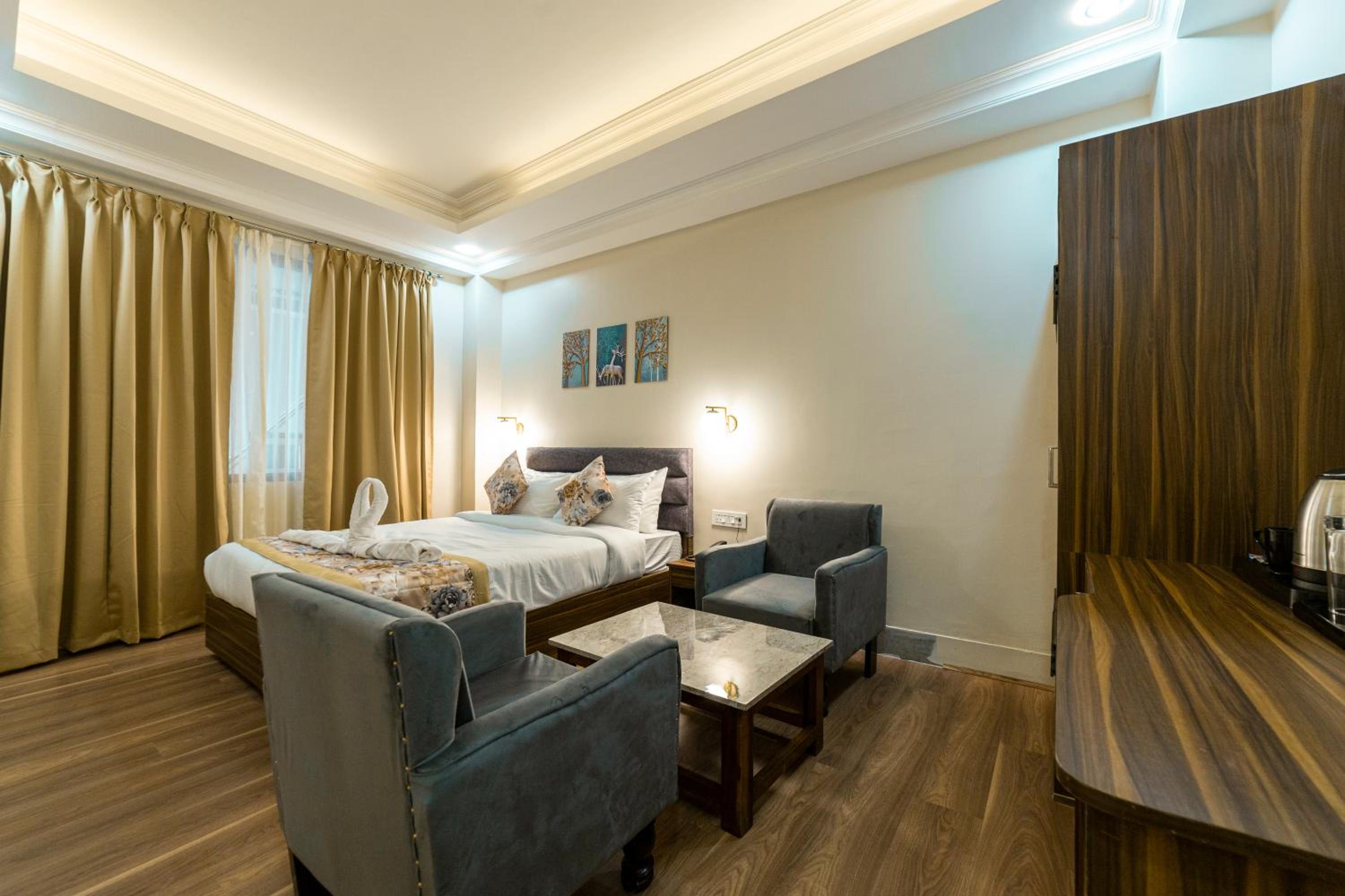 Deluxe Room - Photo 1