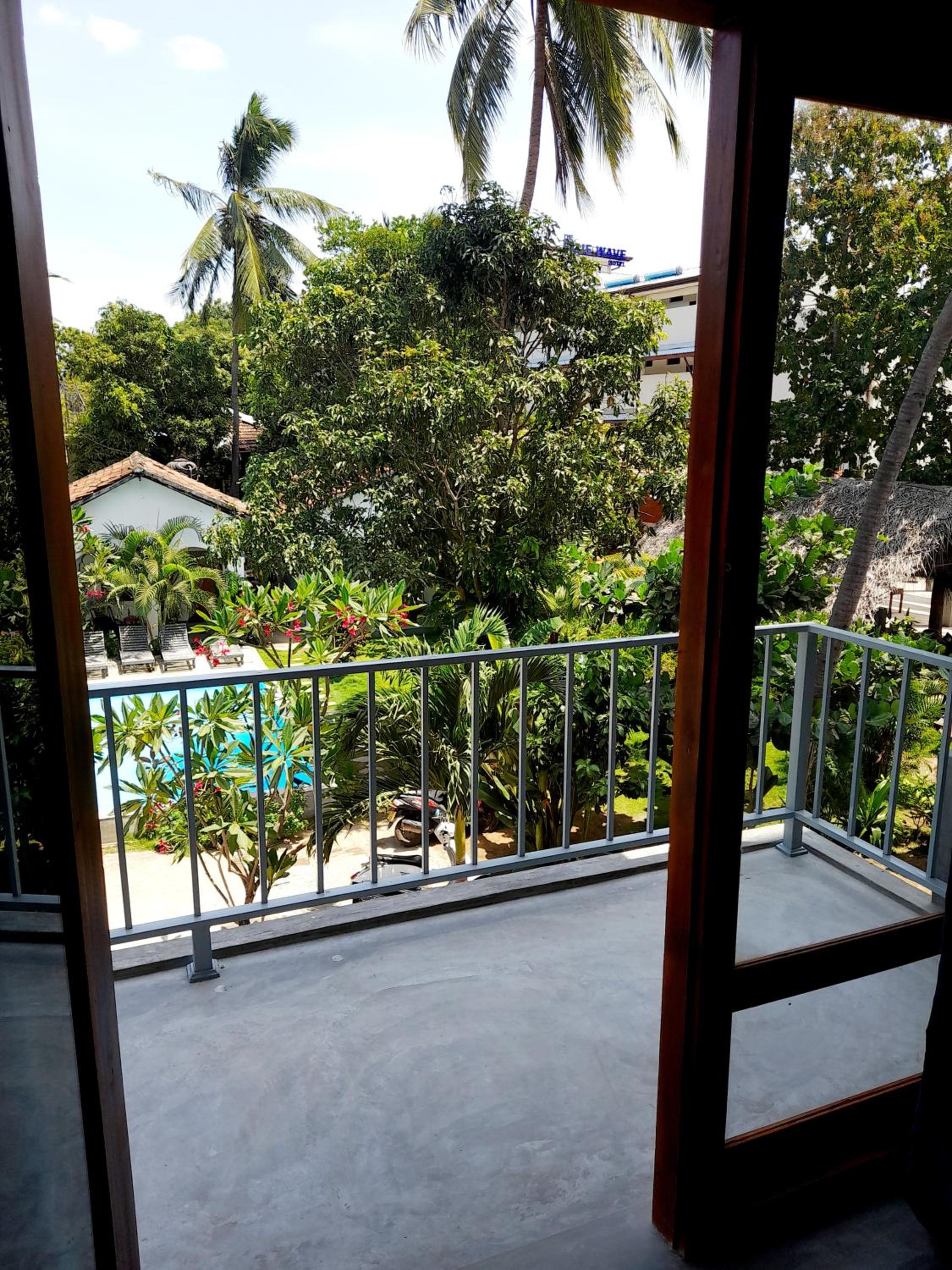Deluxe Double Room with Balcony - Photo 6
