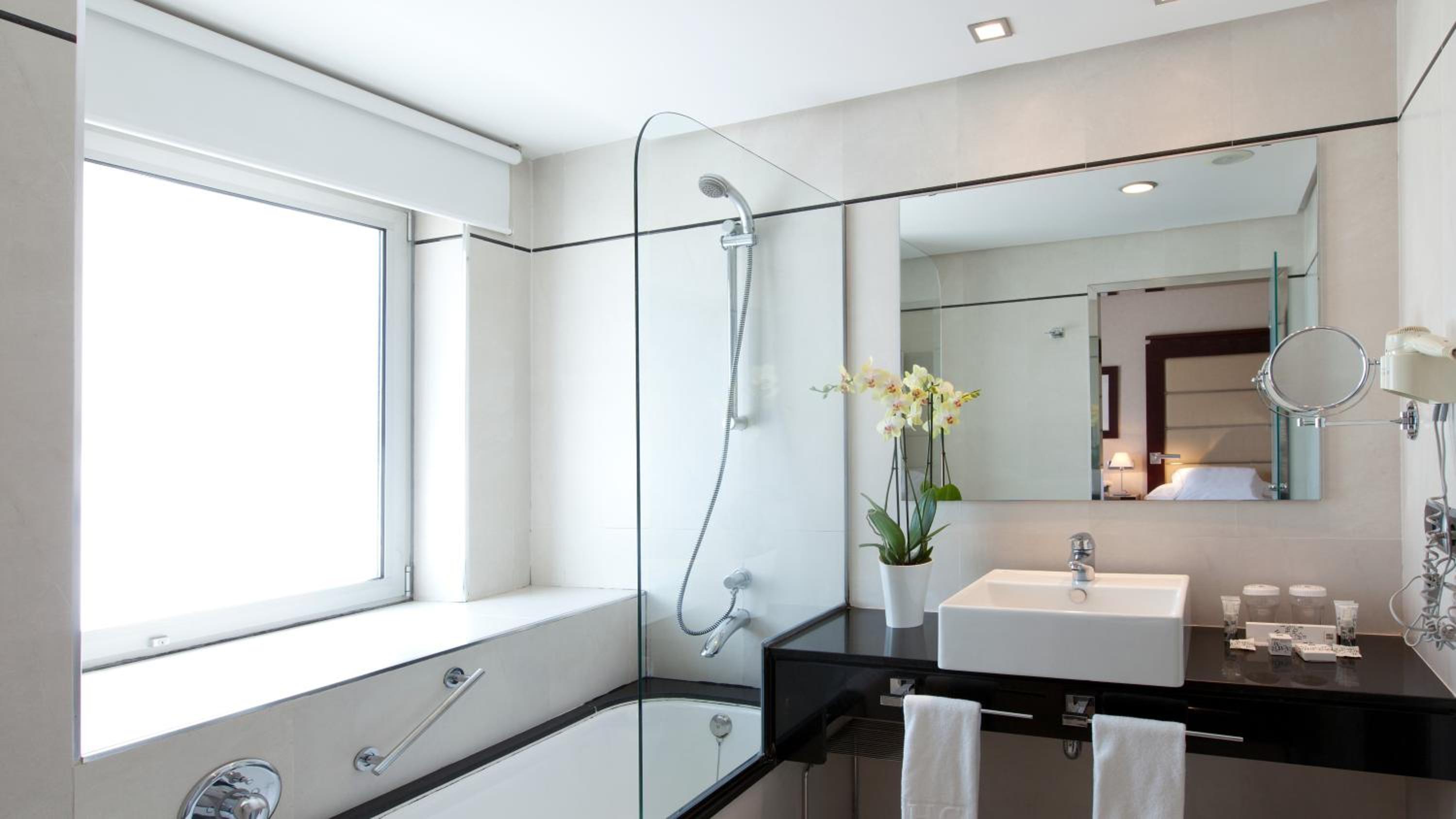 Relax in this elegant and modern bathroom retreat.
