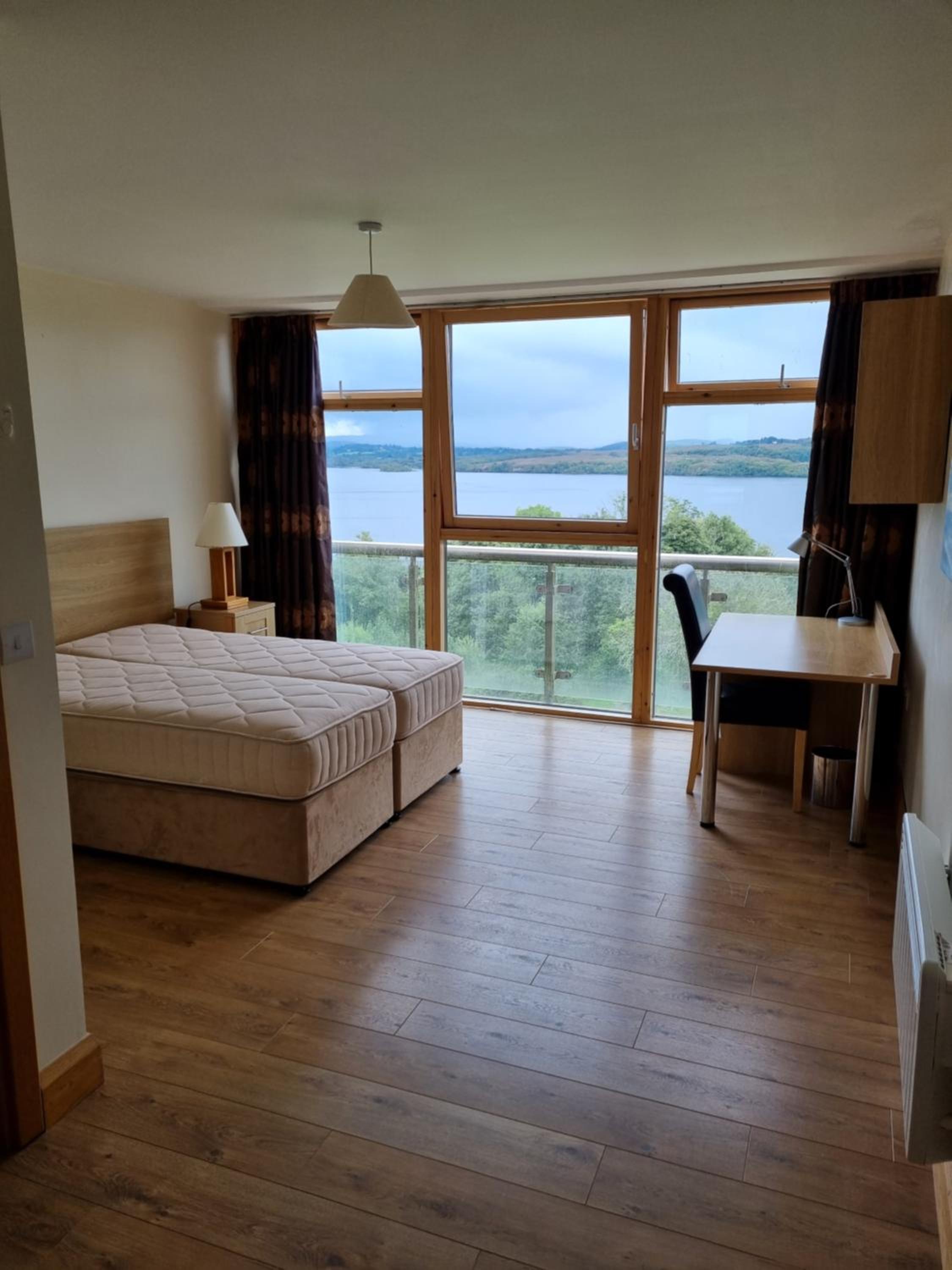 Three-Bedroom Apartment with Lake View