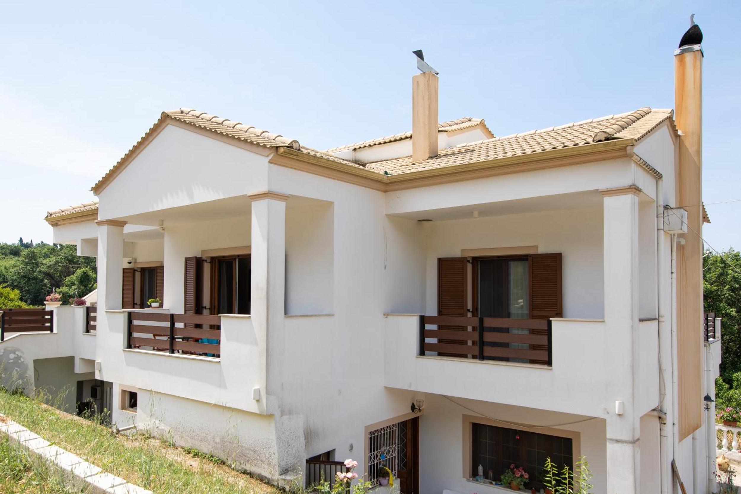 Three-Bedroom House - Photo 18