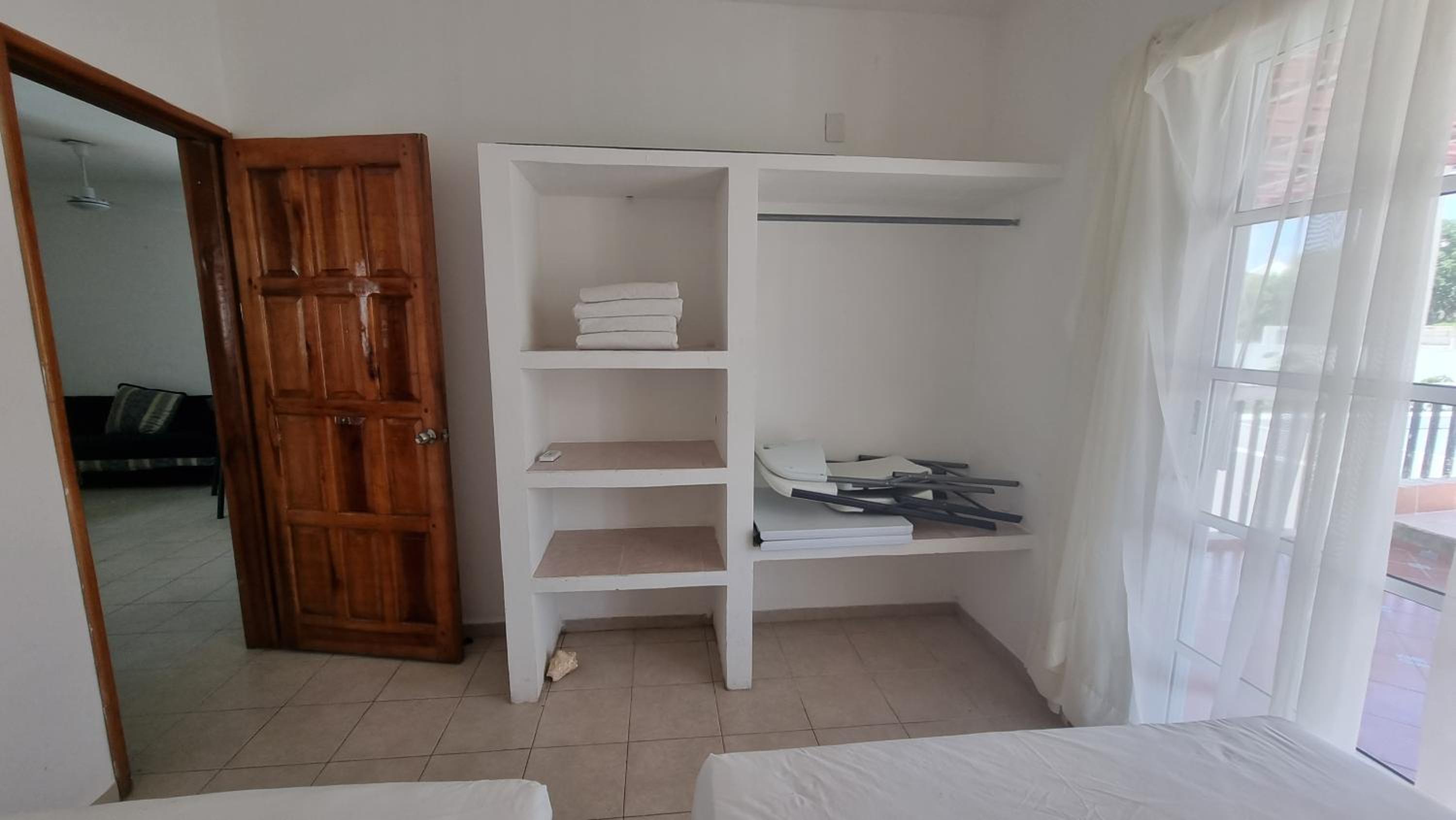Economy Quadruple Room - Photo 8