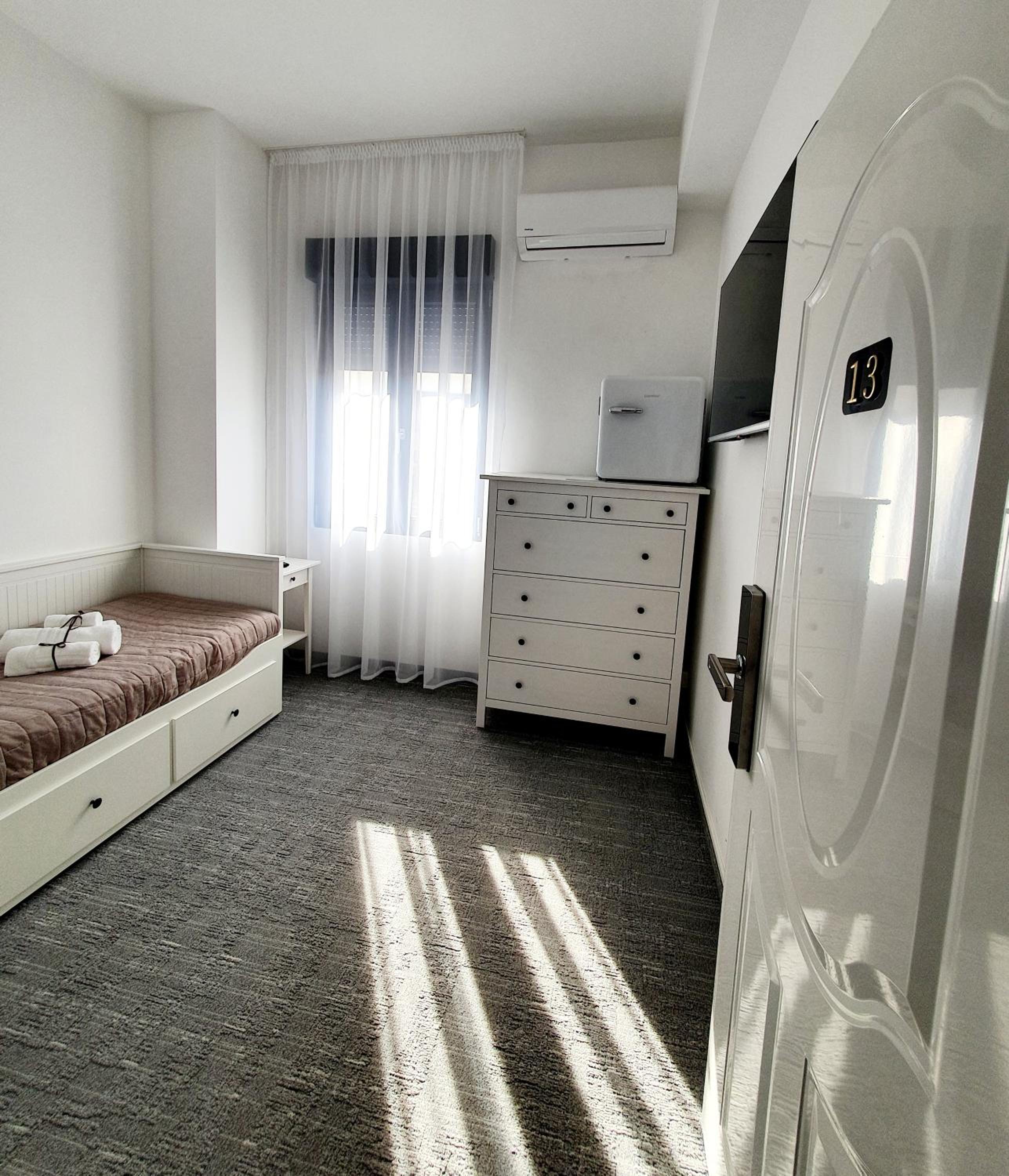 Single Room with Shared Bathroom